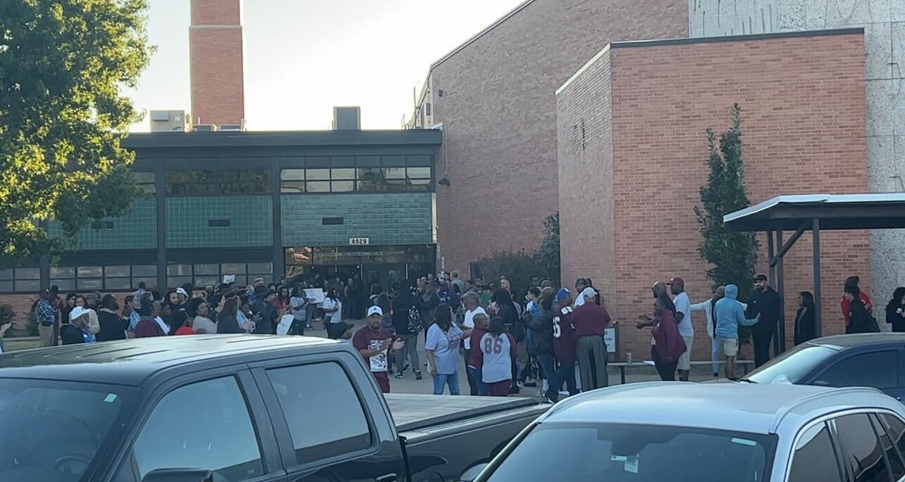 Supporters outside welcoming students to McLain