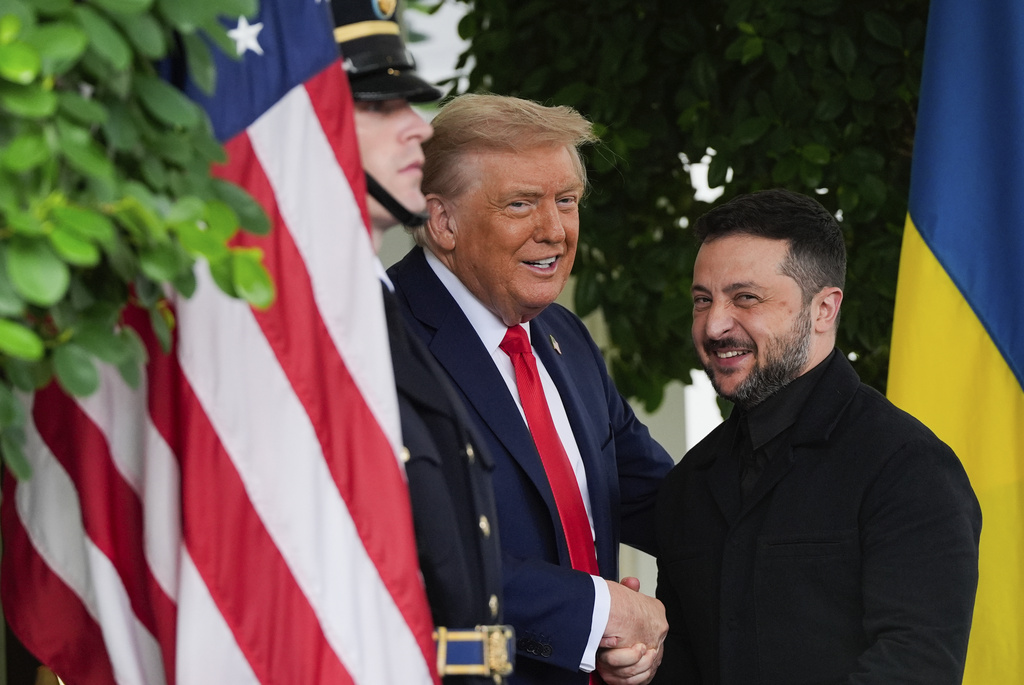 President Donald Trump greets Ukraine's President Volodymyr Zelenskyy at the White House, Monday, Aug. 18, 2025, in Washington. 