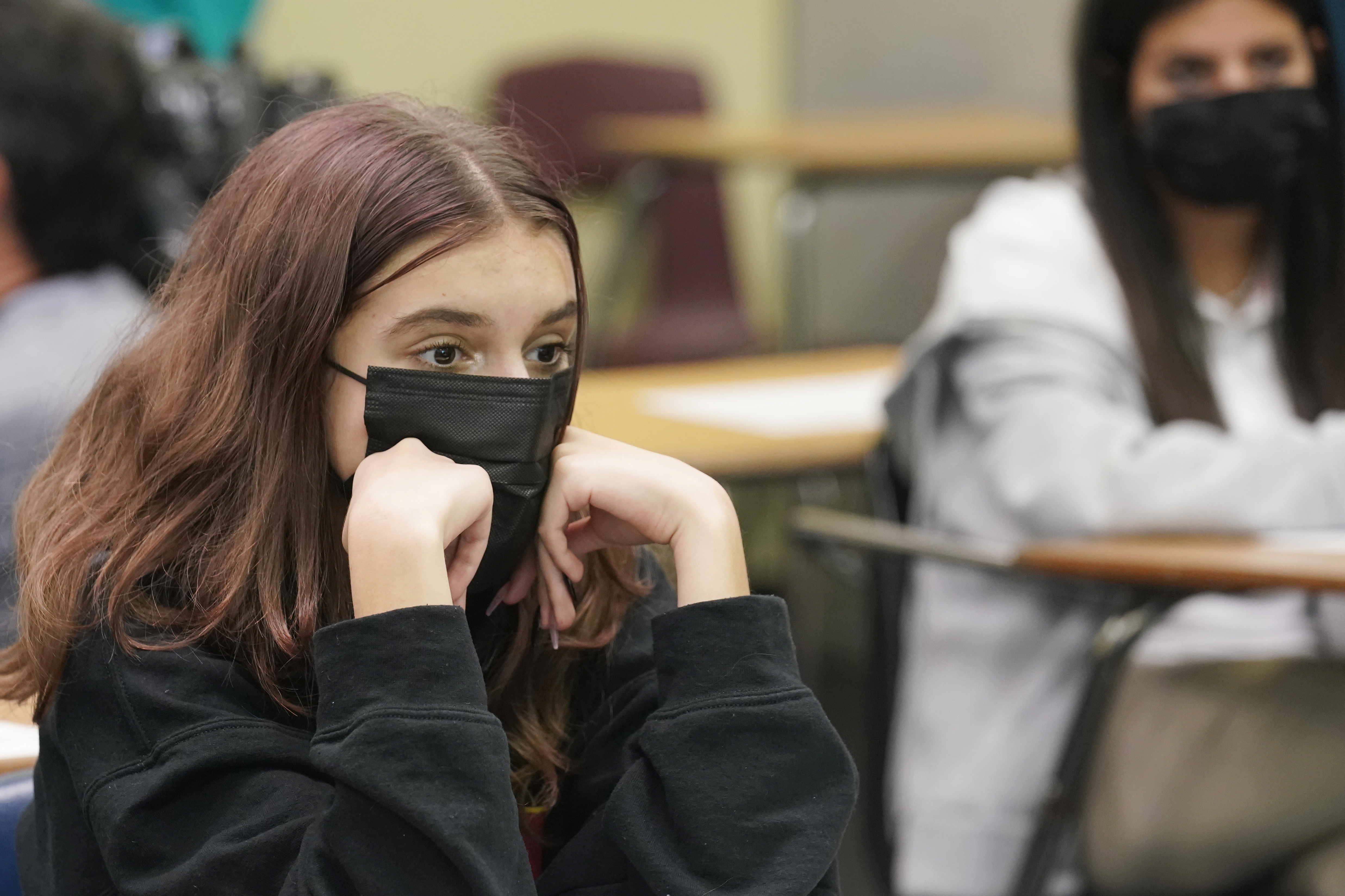 Student wearing mask sits in algebra class at Barbara Coleman Senior High School, Aug. 23, 2021