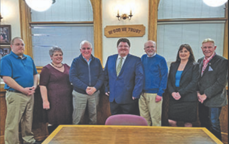 A Genessee County judge is issuing an injunction to stop Shiawassee County employees from spending the hazard pay they just received.