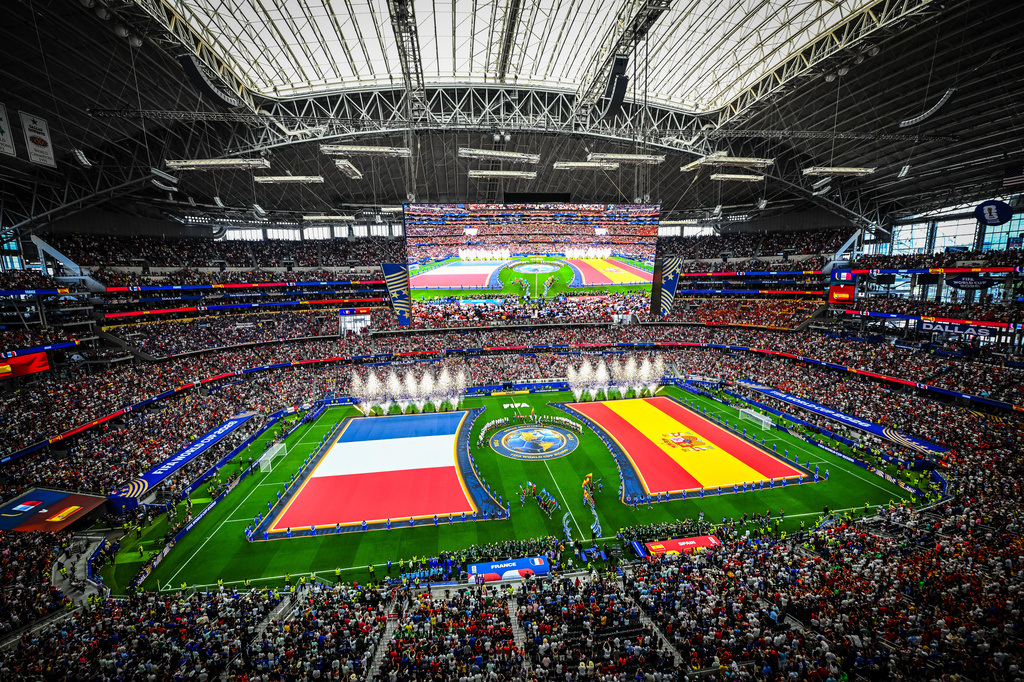 Pyrotechnics are set off during the opening ceremony before the World Cup semifinal soccer match in Arlington, Texas, near Dallas, Tuesday, July 14, 2026. 