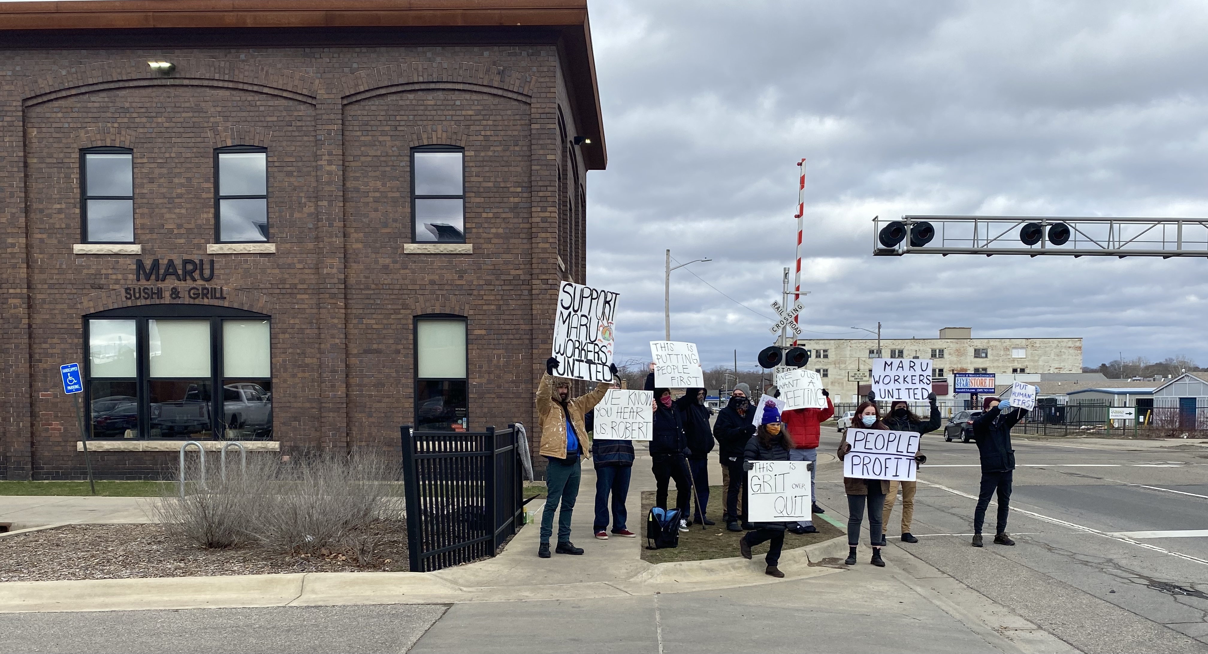 Maru Sushi workers on strike in Kalamazoo