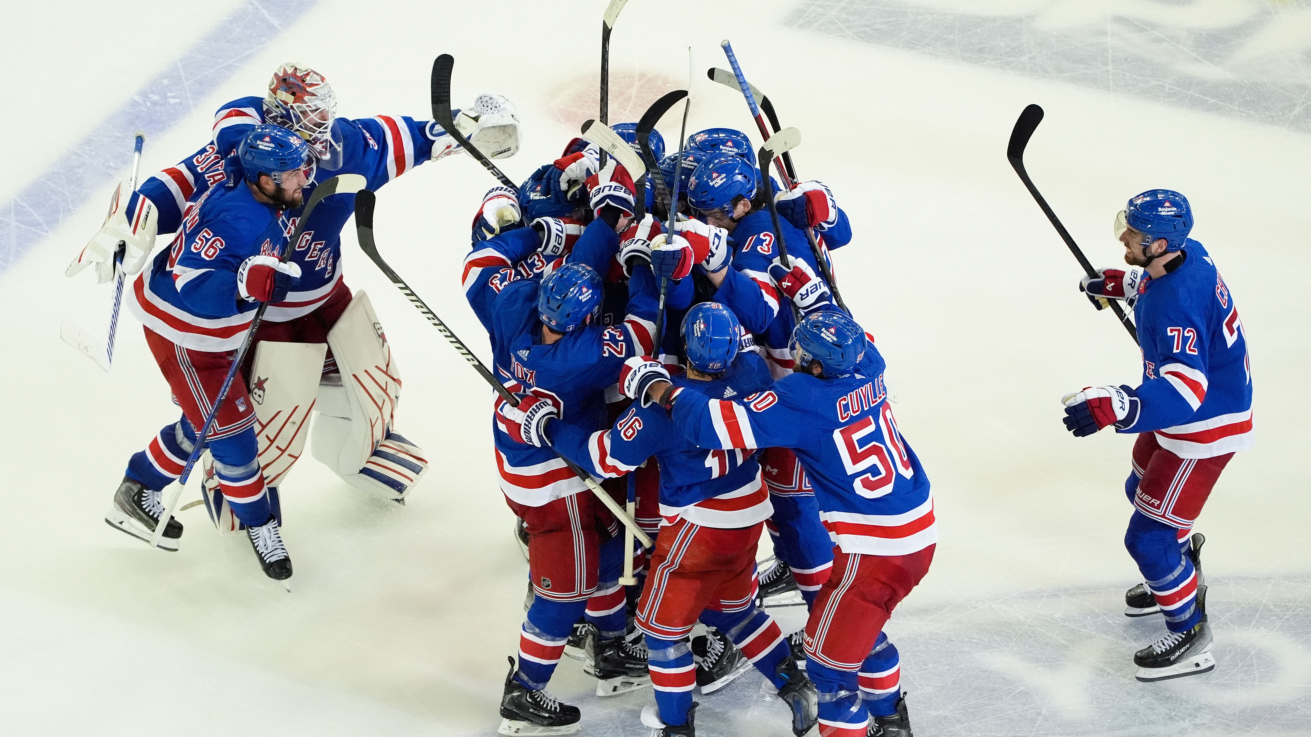 The New York Rangers celebrate after beating the Florida Panthers in overtime of Game 2 during the Eastern Conference finals of the NHL hockey Stanley Cup playoffs, Friday, May 24, 2024, in New York. (AP Photo/Julia Nikhinson)