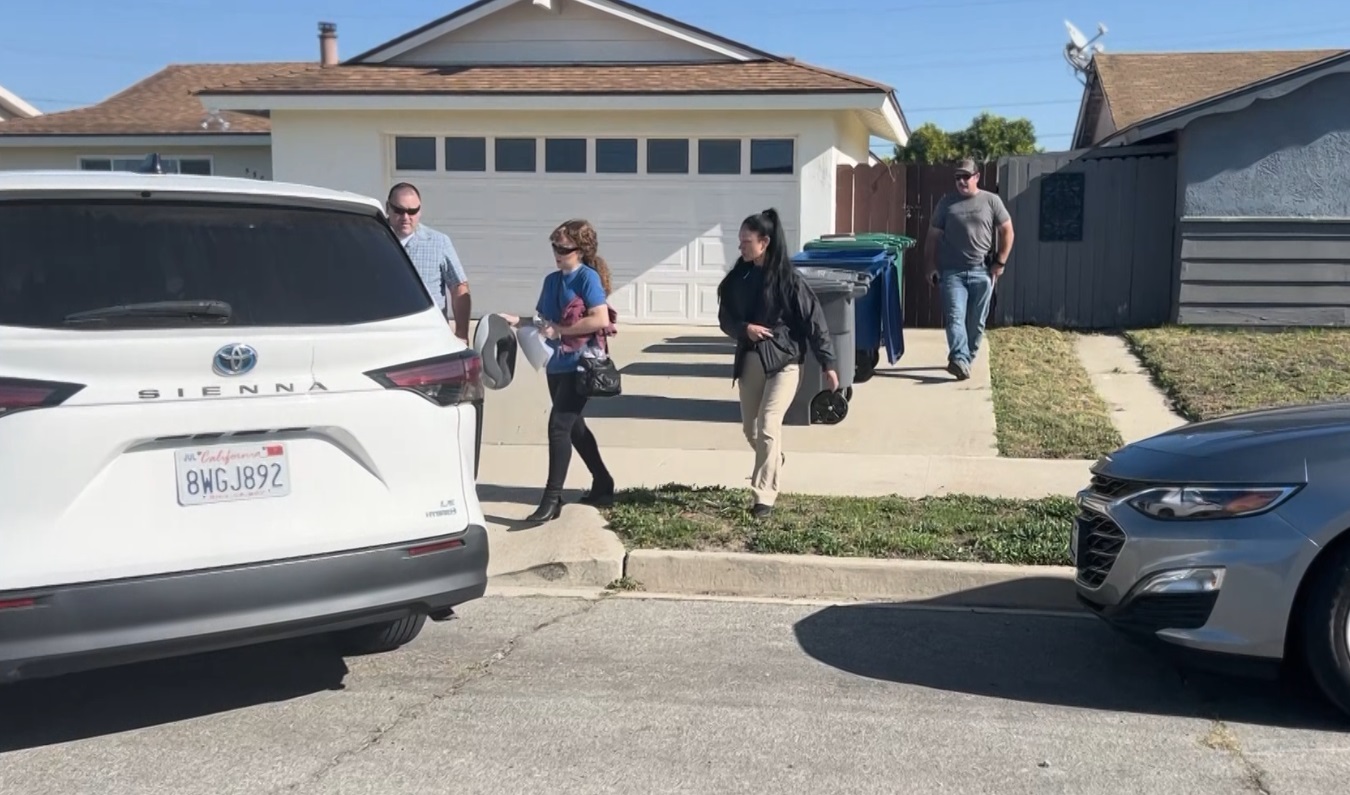 ASHLEY GOING INTO VAN.jpg