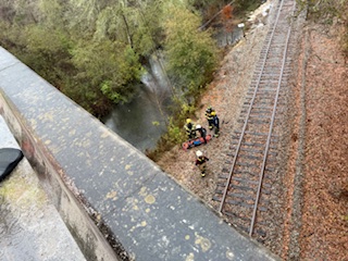 Man jumps off bridge