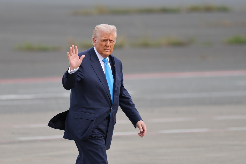 U.S. President Donald Trump walks towards Air Force One at Haneda Airport in Tokyo for his departure to South Korea, Wednesday, Oct. 29, 2025.