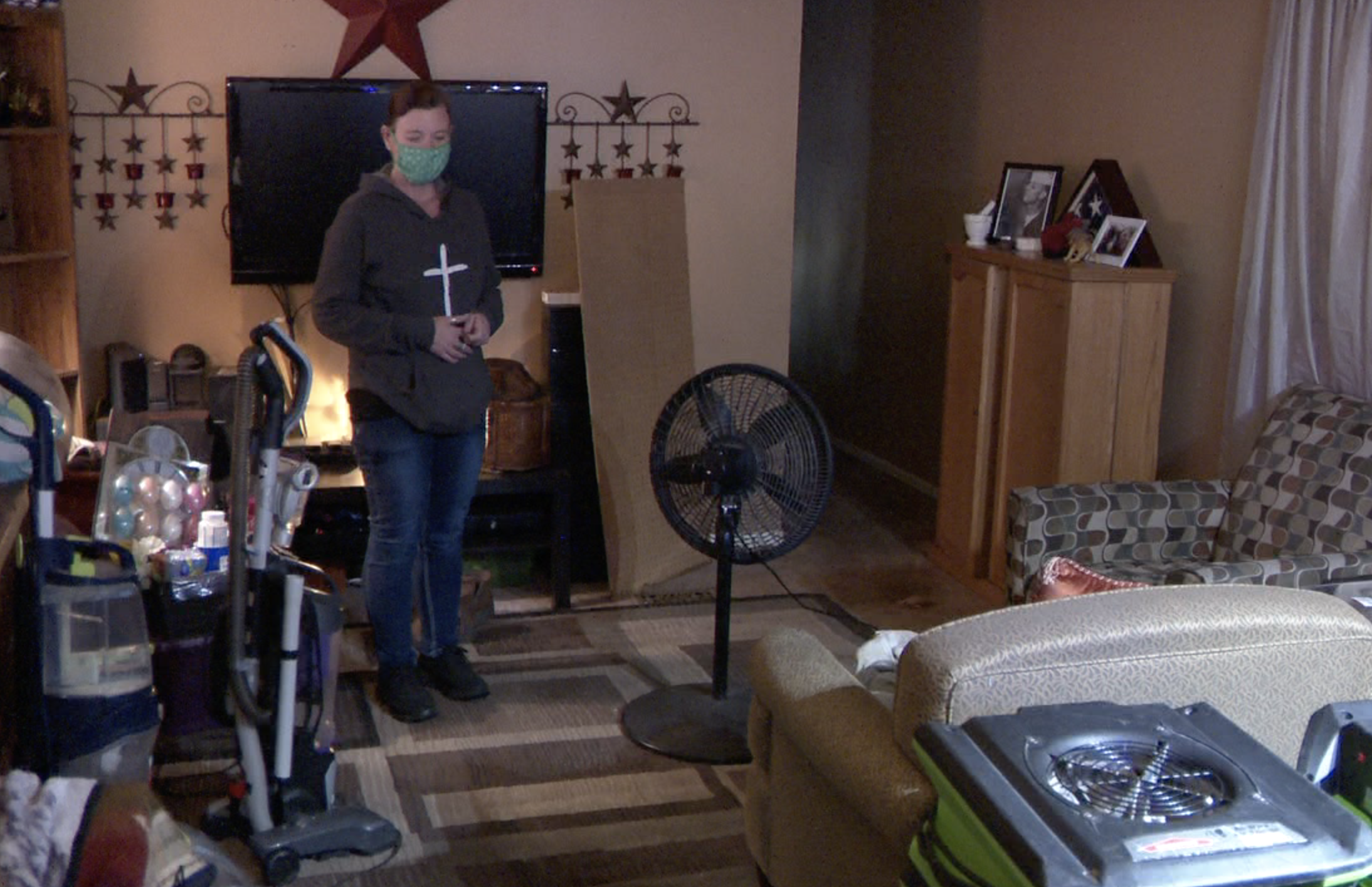 Kelly Salazar in her flooded home