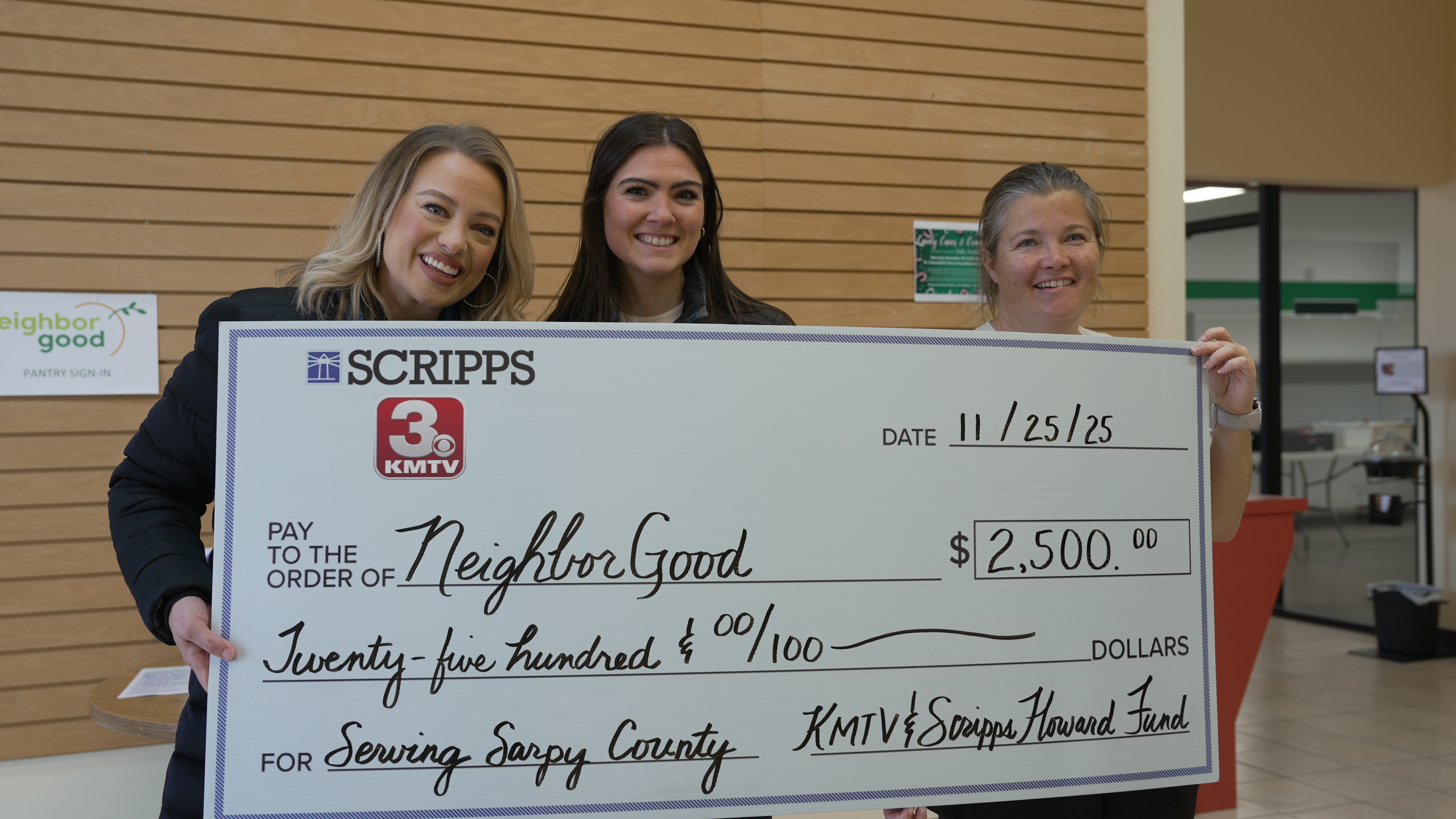 Left to right: Mary Nelson and Greta Goede of KMTV, Melissa Nelson, executive director at NeighborGood.