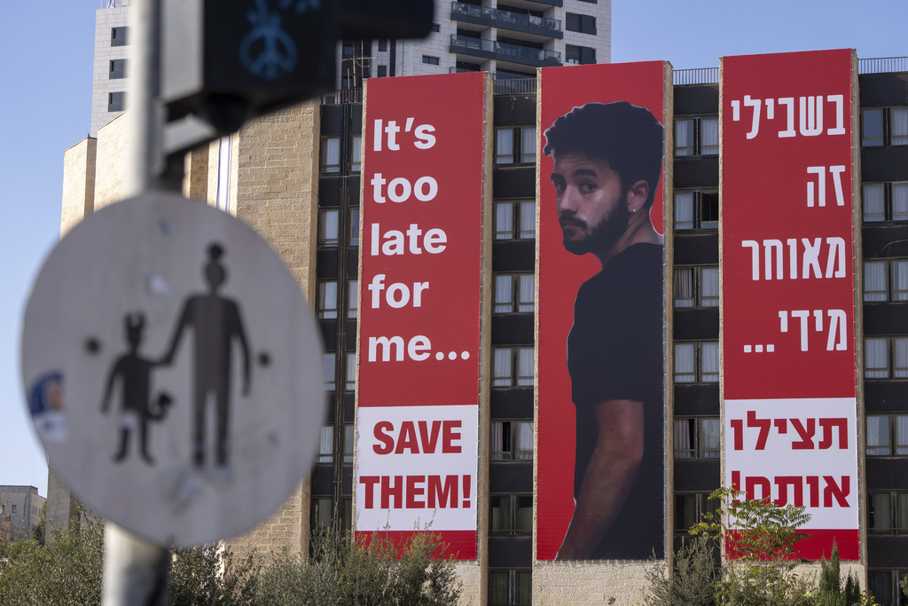 Banners showing Hersh Goldberg-Polin, a 23-year old hostage who died in Hamas captivity in Gaza, hang in Jerusalem.