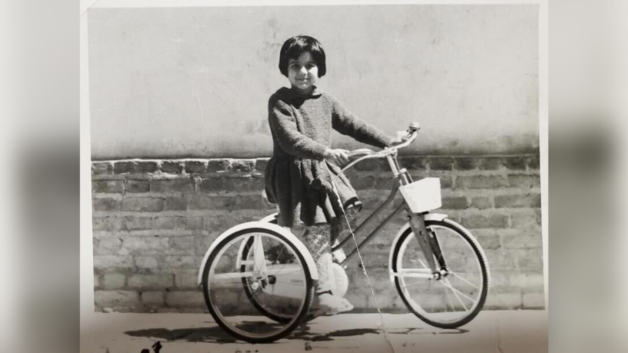 Fariba Rezvani Cavitt rides her bike in her home country of Iran