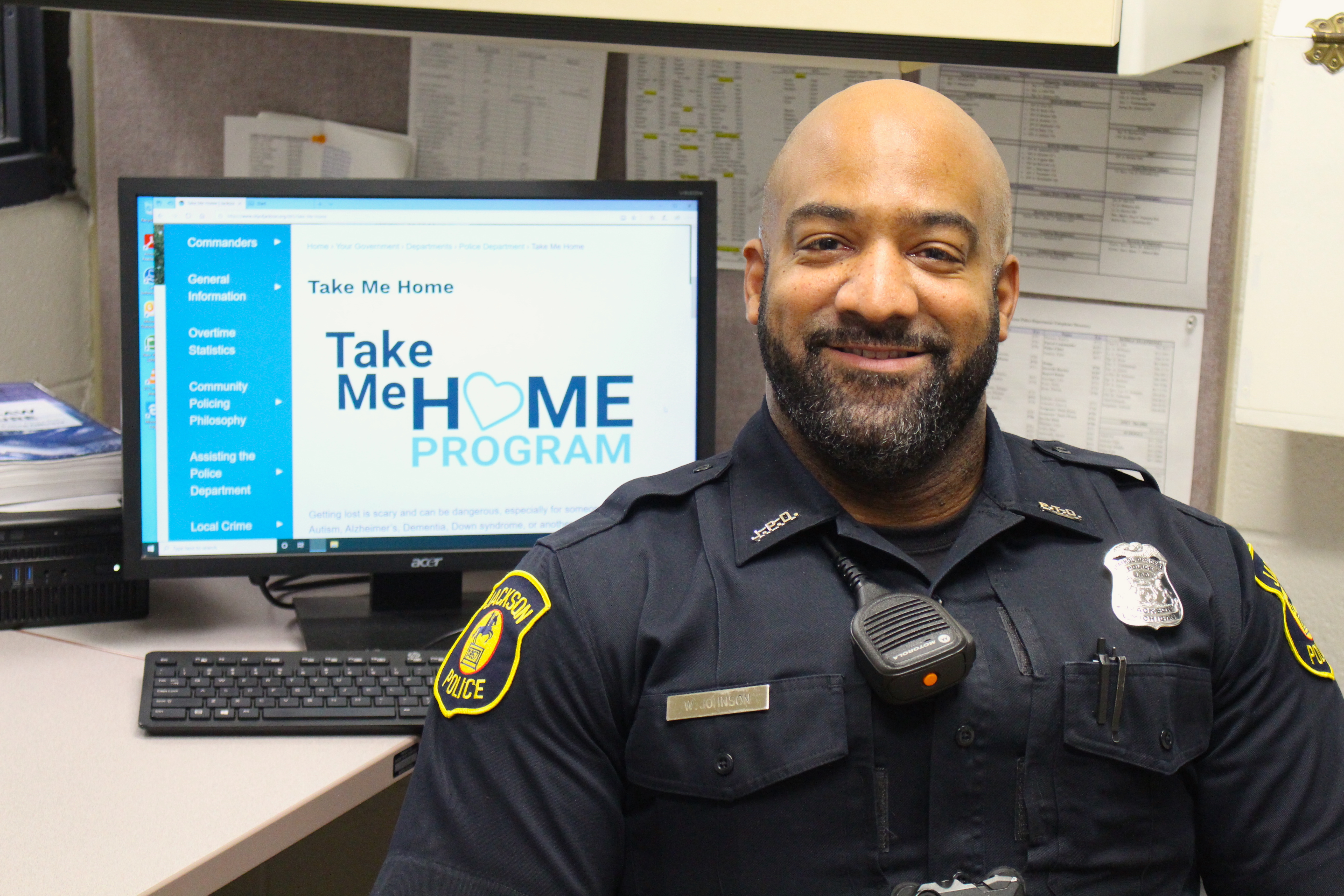 Jackson Police Officer Warren Johnson with Take Me Home webpage