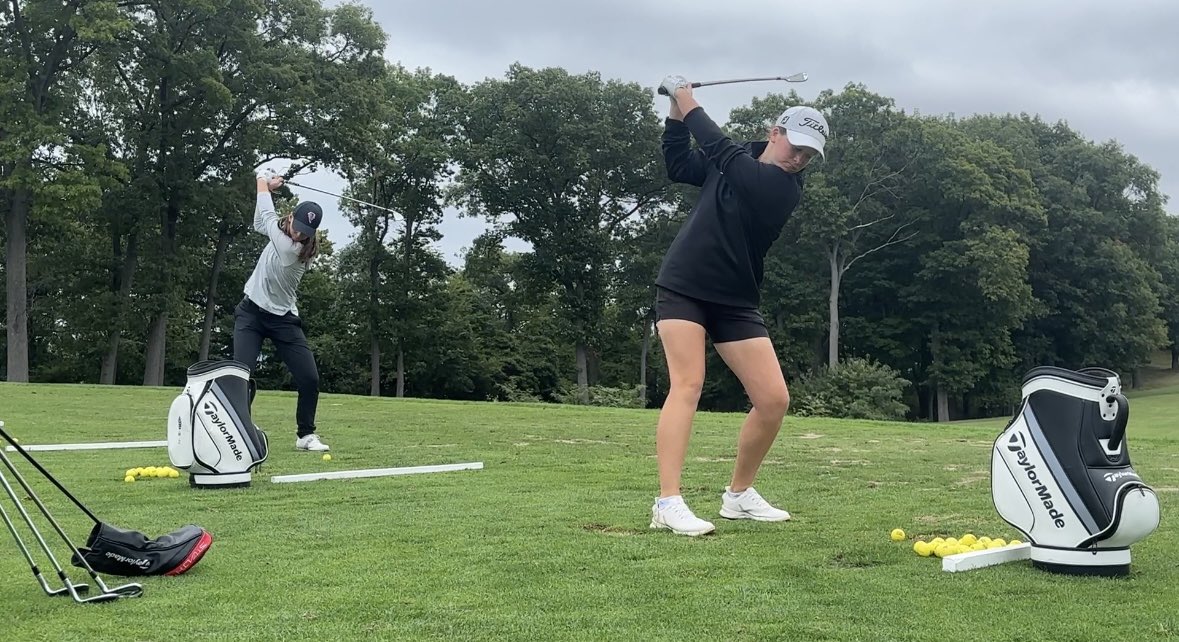 Elise Fennell and Jessica Jolly hit at the range at Muskegon Country Club