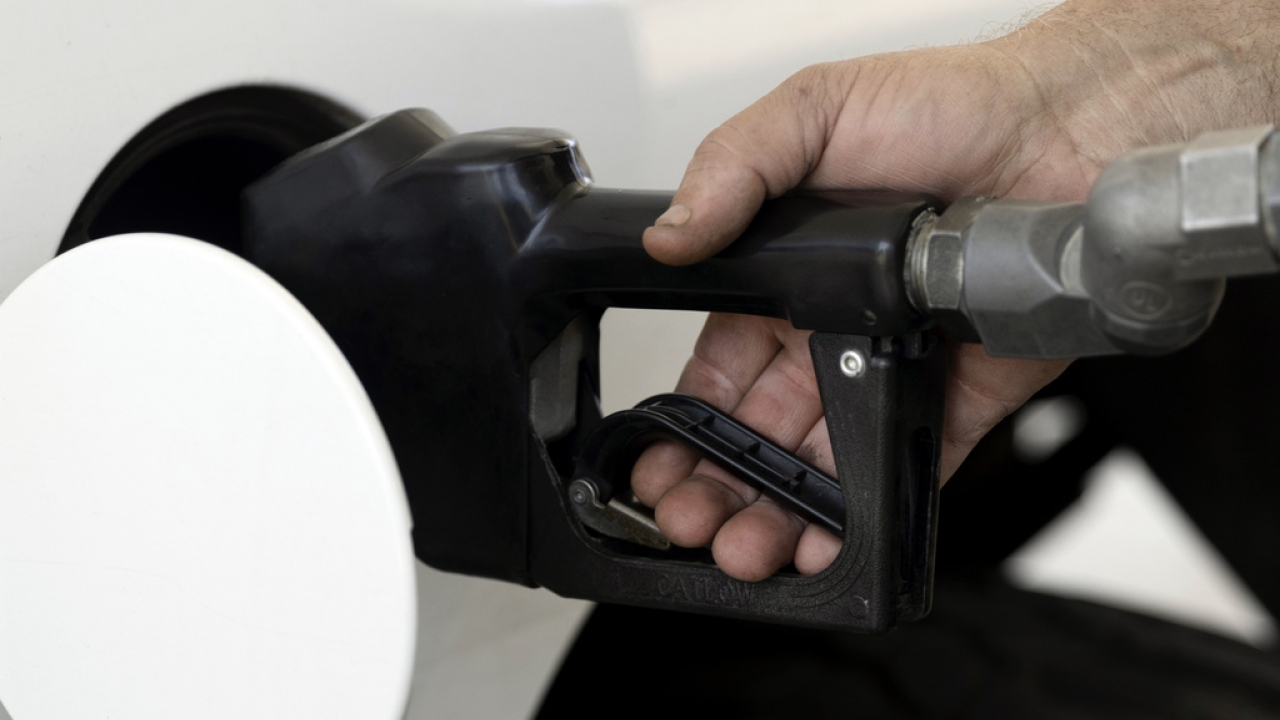 A man pumps his own gas Friday, Aug. 4, 2023, in Eugene, Ore.