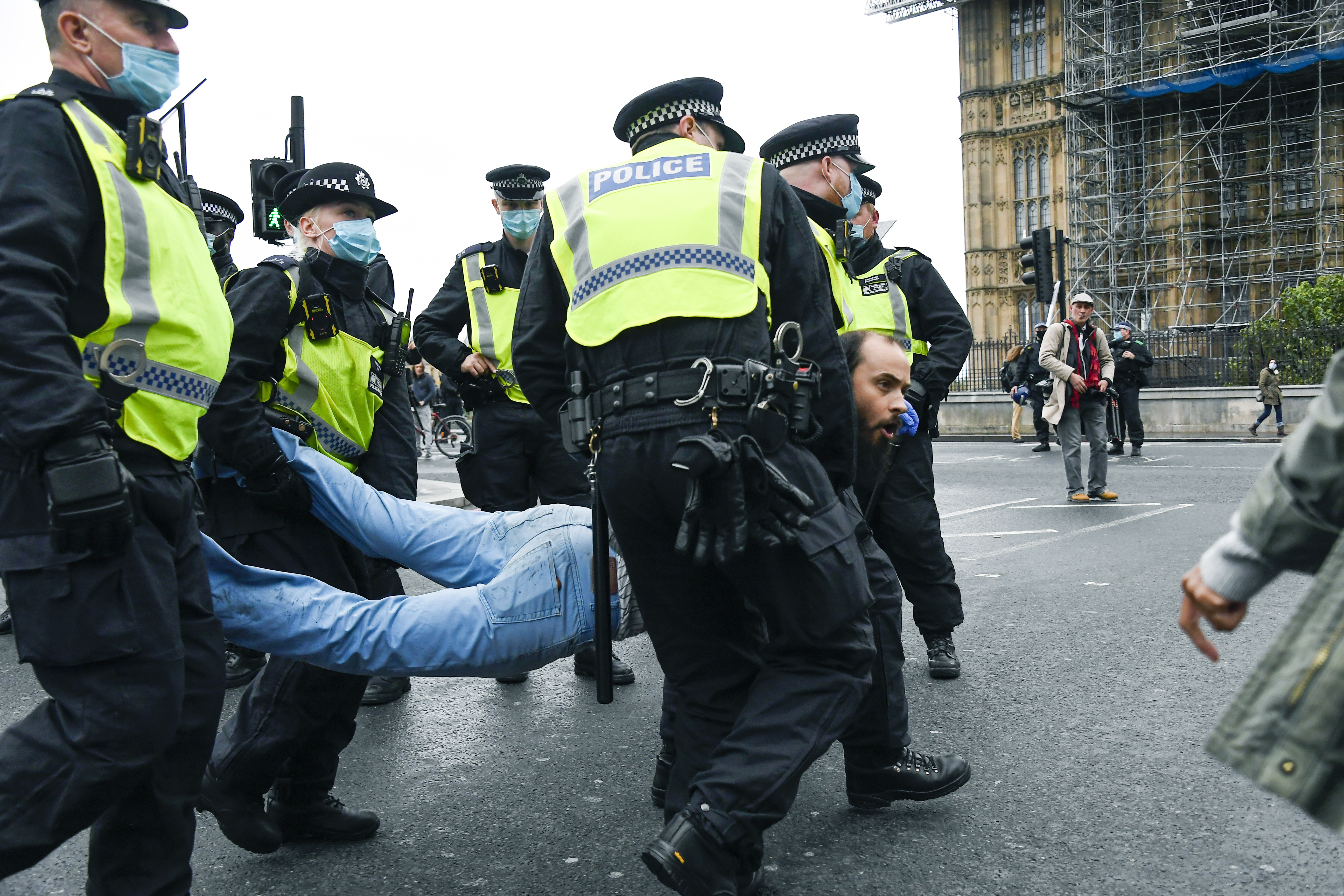 APTOPIX Virus Outbreak Britain Protest