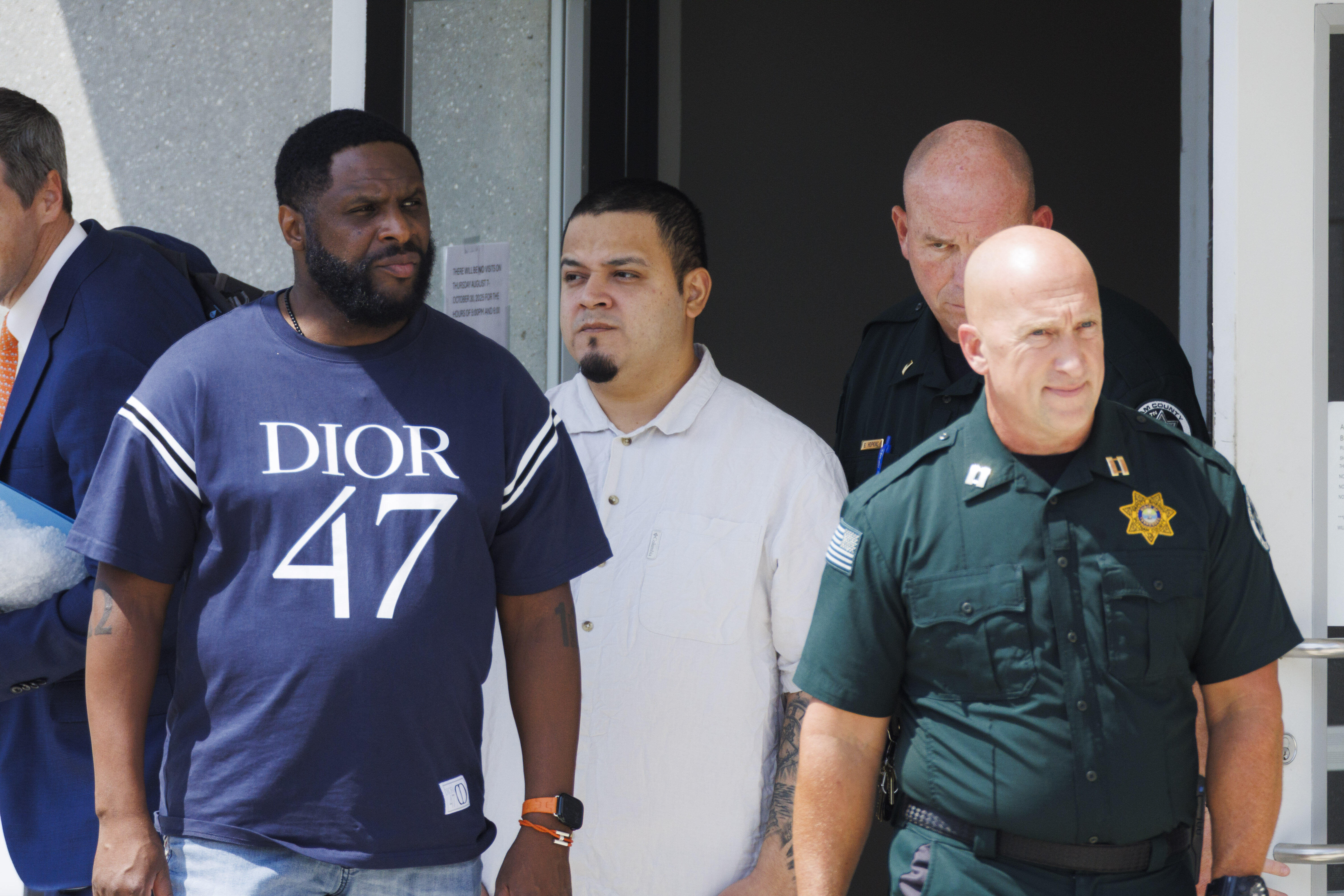 Kilmar Abrego Garcia, third from right, leaves the Putnam County Jail, Friday, Aug. 22, 2025, in Cookeville, Tenn. 