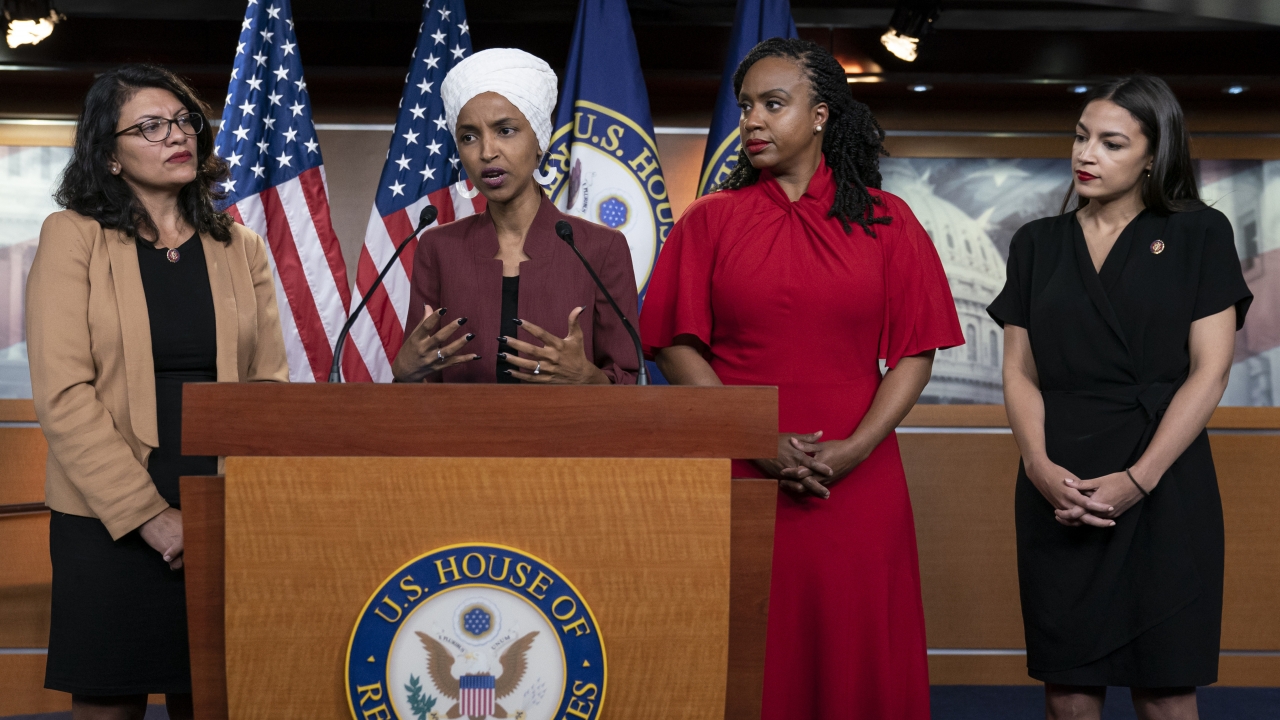 U.S. Representatives Rashida Tlaib, Ilhan Omar, Ayanna Pressley, and  Alexandria Ocasio-Cortez.