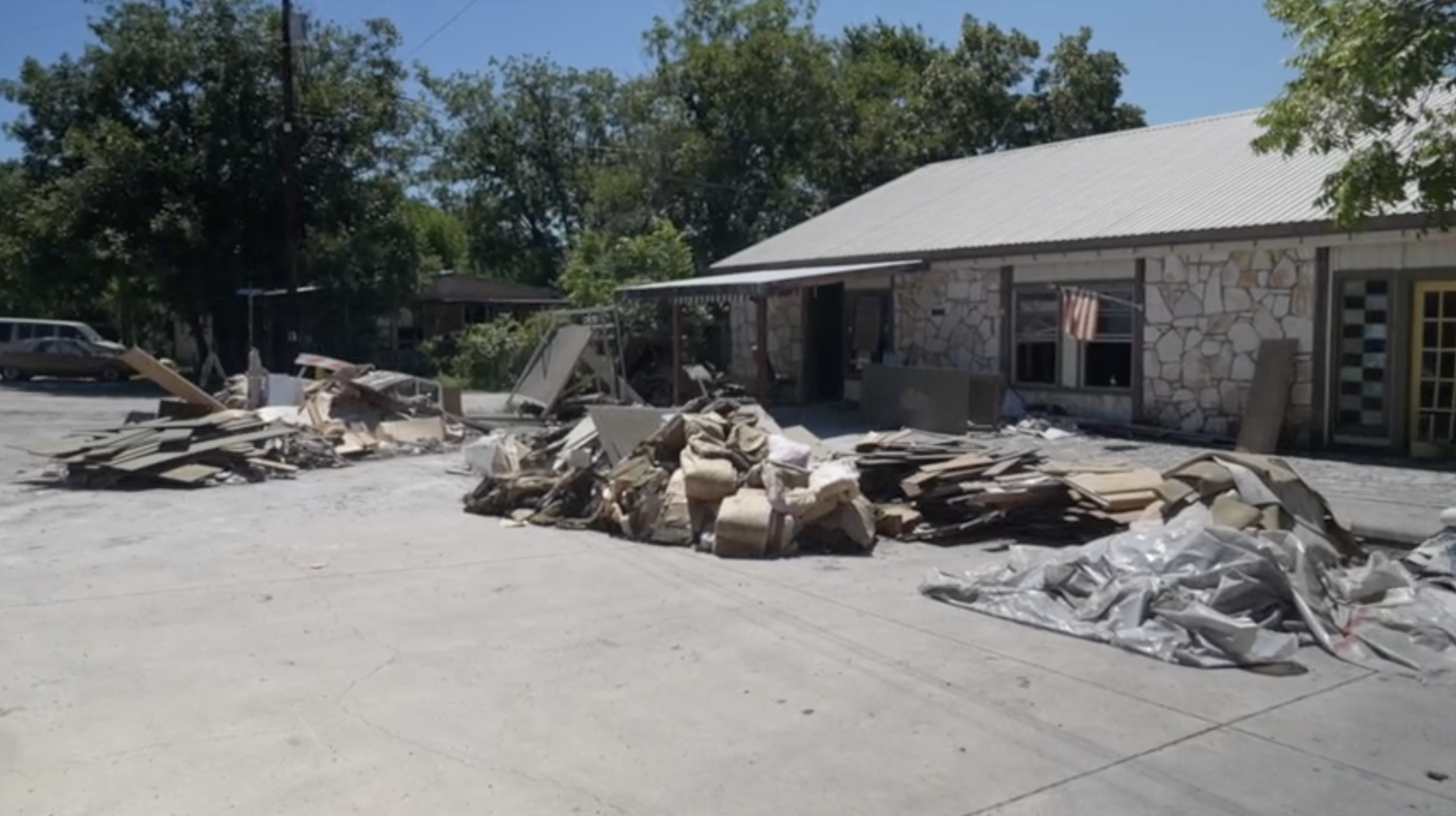 Piles of debris are seen following deadly flash floods in Central Texas.