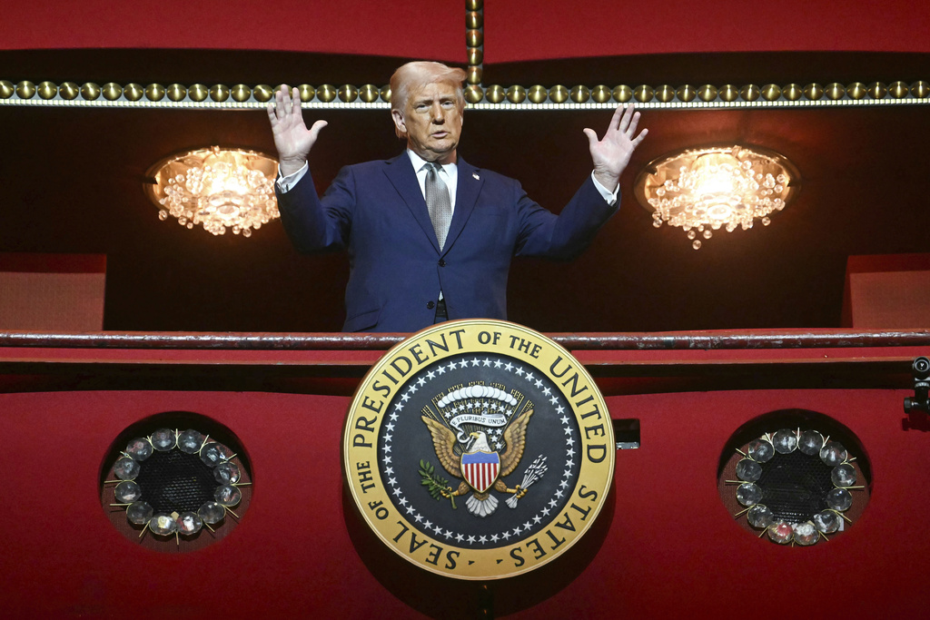 President Donald Trump stands in the presidential box as he tours the John F. Kennedy Center for the Performing Arts in Washington, Monday, March 17, 2025. 