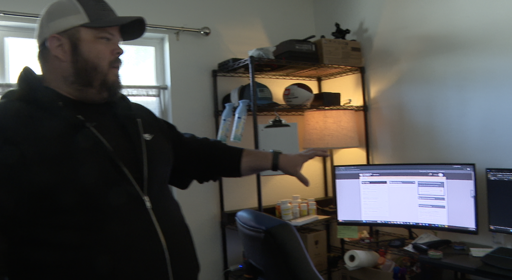 Dylan Langford showing ABC 10News his study set-up. 