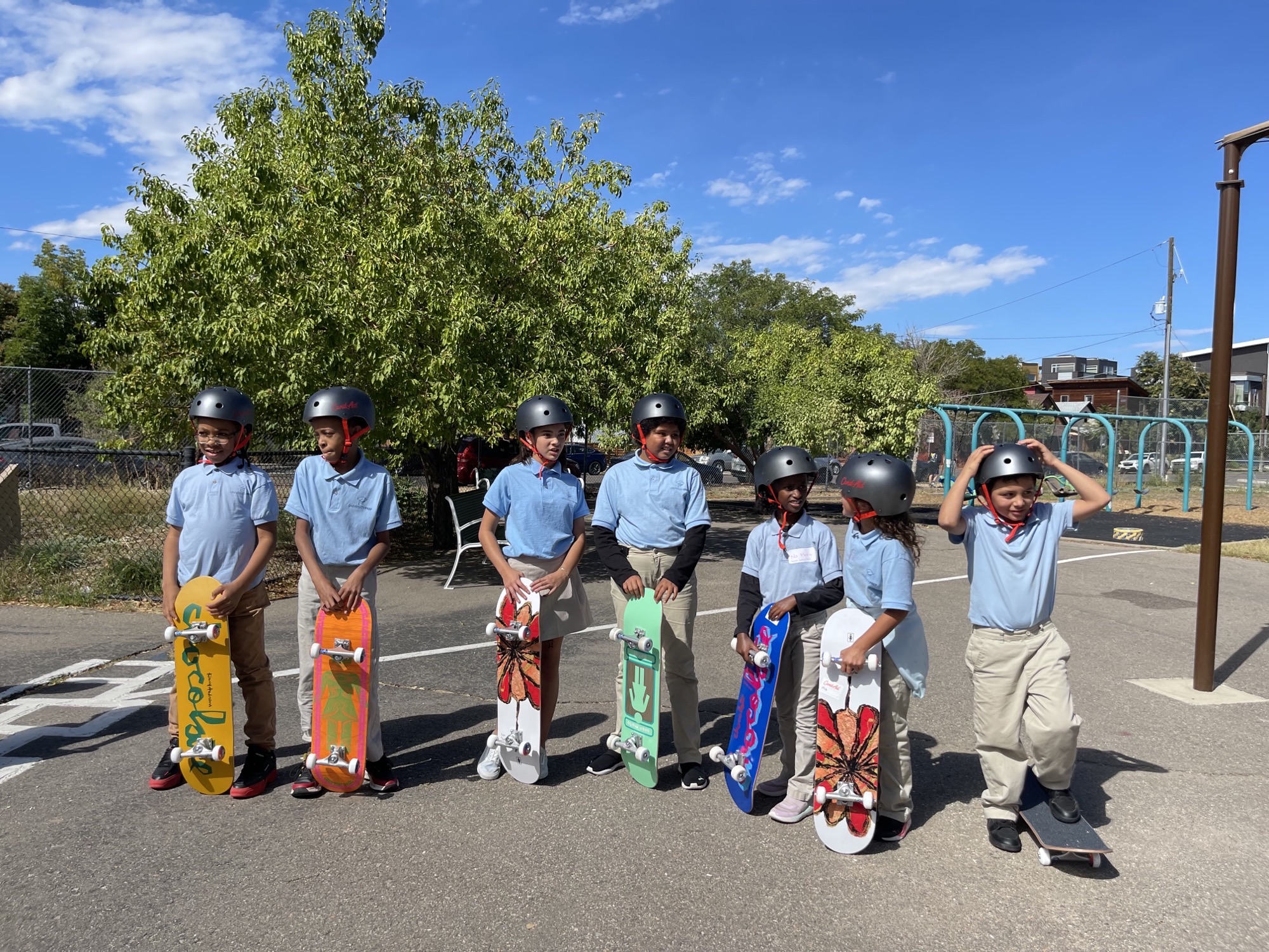 Can'd Aid donates 65 skateboards to local 5th graders