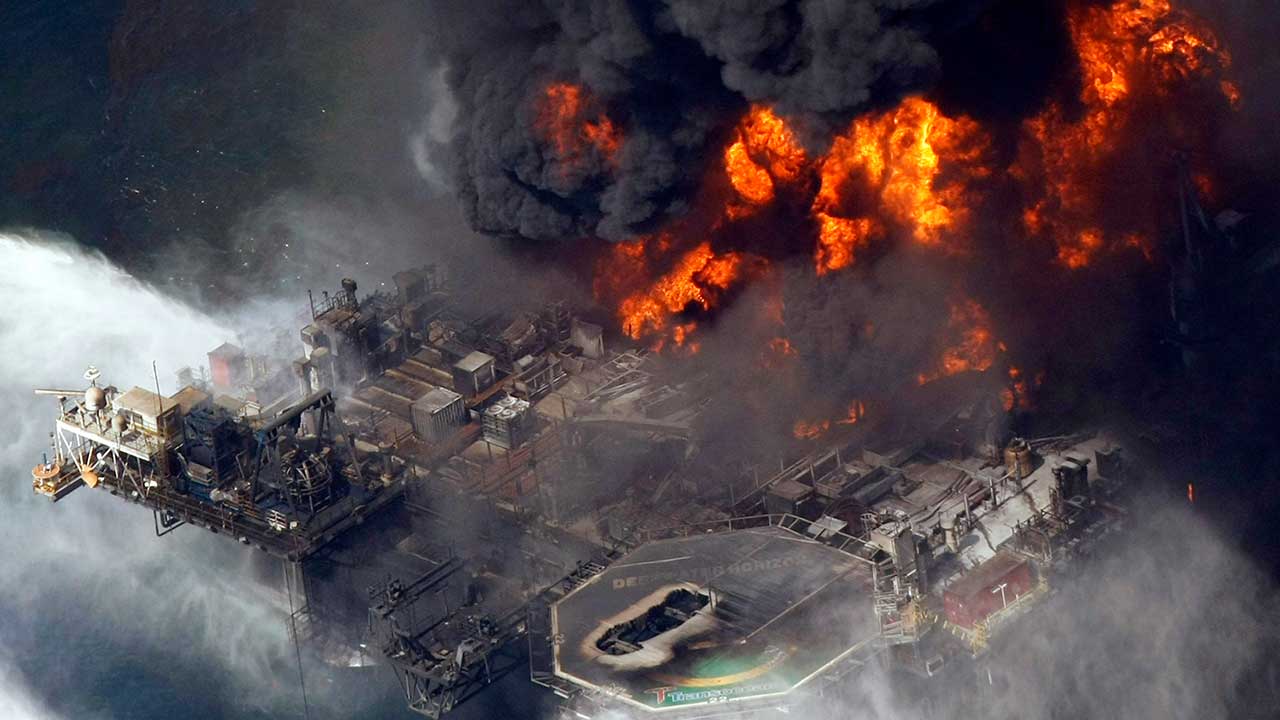 FILE - In an April 21, 2010, file photo taken in the Gulf of Mexico more than 50 miles southeast of Venice, La., the Deepwater Horizon oil rig burns. As oil spewed into the Gulf of Mexico from a blown-out BP well in 2010, residents wondered whether their home would ever be the same. The Deepwater Horizon disaster changed the region, with a flood of spending altering landscapes and attitudes. 