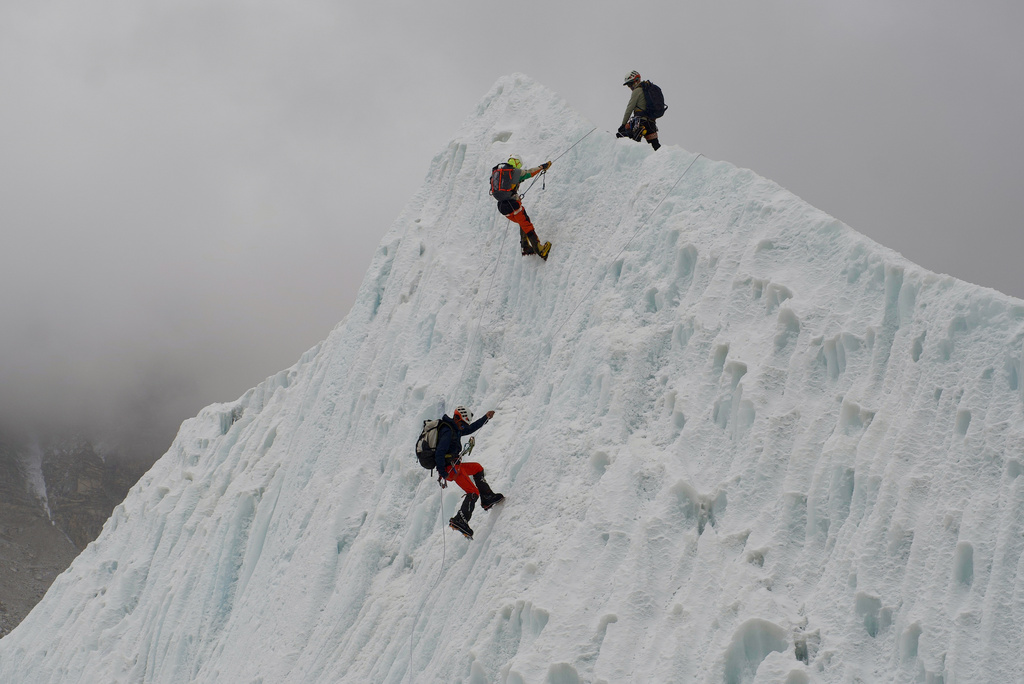 Mountaineers participate in a training session at the Khumbu Icefall as they prepare for their ascent to the summit of Mount Everest, Nepal, Saturday, May 2, 2026. 