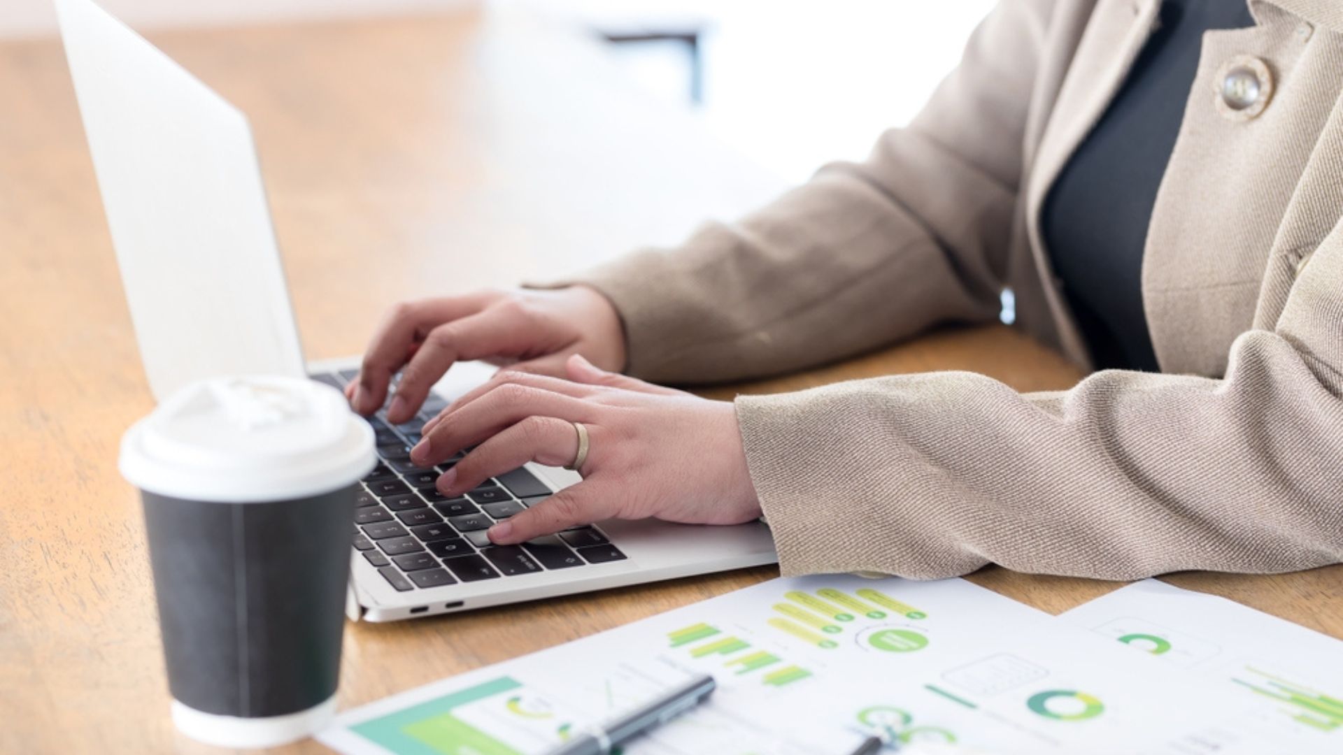 Stock image of a businesswoman working on a laptop.