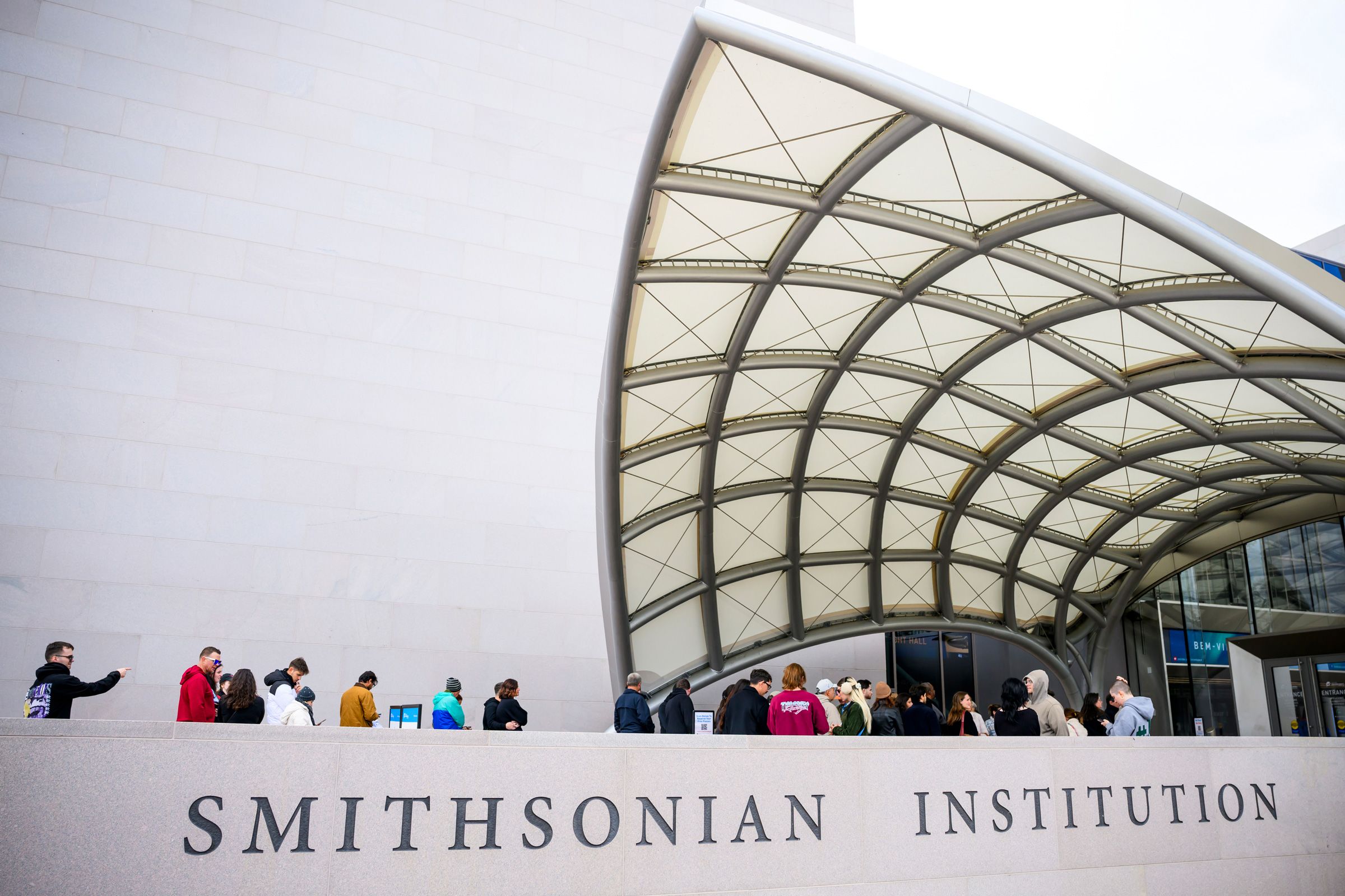 Visitors in line at the Smithsonian Institute's National Air and Space Museum following the end of the federal government shutdown in Washington, D.C., on Friday.