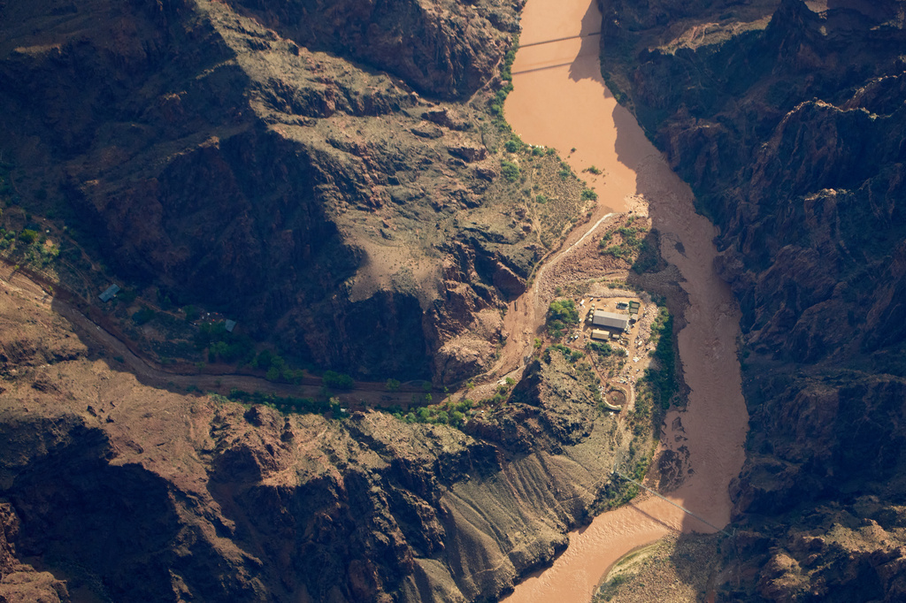 Bright Angel Canyon, damaged by flash floods, runs into the Colorado River in the Grand Canyon, Monday, Aug. 31, 2026, at Grand Canyon National Park, Ariz.