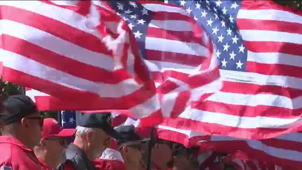 Veterans with U.S. flags