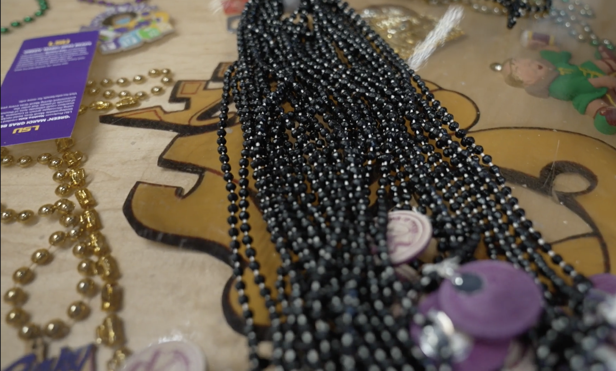 These may look like normal Mardi Gras beads, but are made of algae. Professor Naohiro Kato, a biological sciences at Louisiana State University, developed the biodegradable beads, which are making their public debut this year during some Carnival parades.
