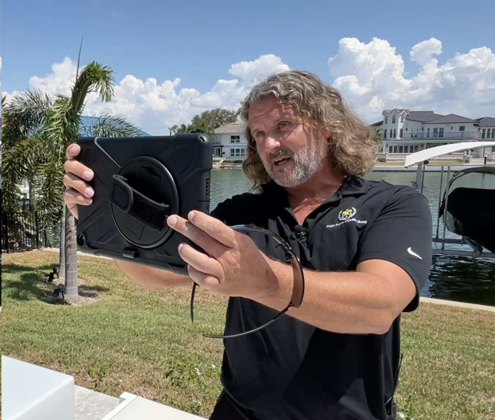 Joseph Ross evaluates damage at a Clearwater Beach home
