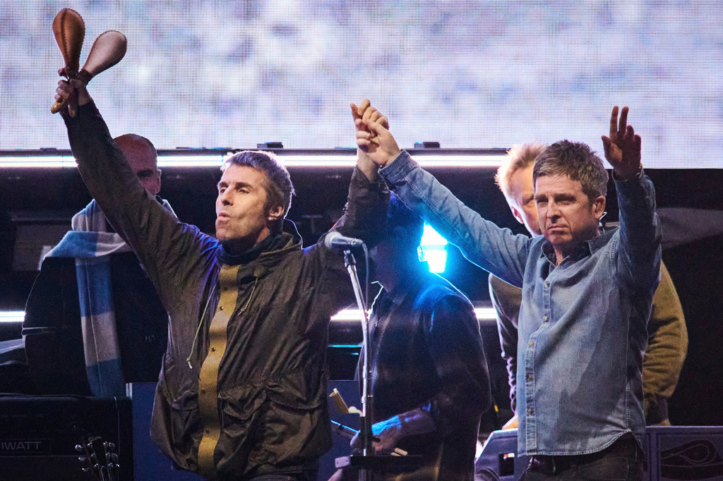 FILE - Liam Gallagher, left, and Noel Gallagher of Oasis appear during their reunion tour in Toronto on Aug. 24, 2025.