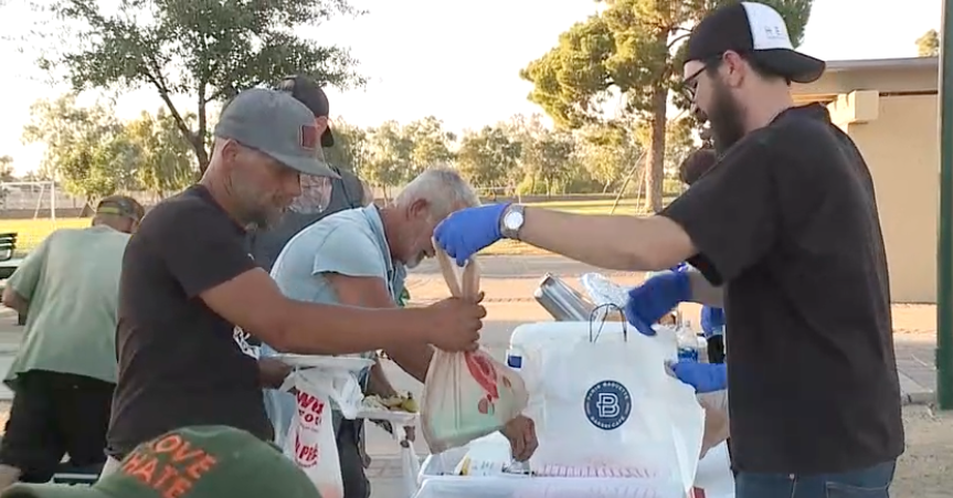Feeding unhoused people in a Phoenix park