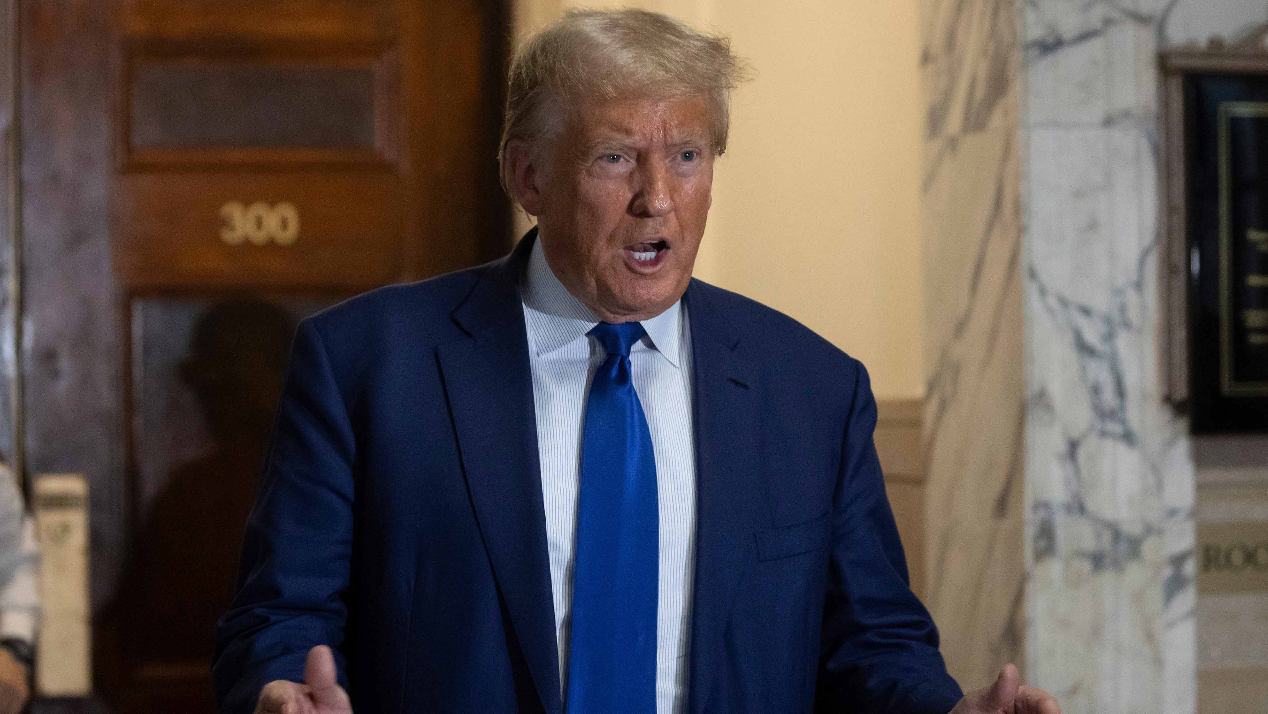 Former President Donald Trump arrives at the courtroom for his civil business fraud trial at New York Supreme Court, Wednesday, Oct. 25, 2023, in New York. 