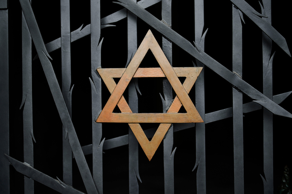 The star of David at the Jewish memorial at the Dachau concentration camp memorial site where more than 43,000 people were murdered and over 200,000 were imprisoned during the Nazi terror reign from 1933-1945 in Dachau, Germany.