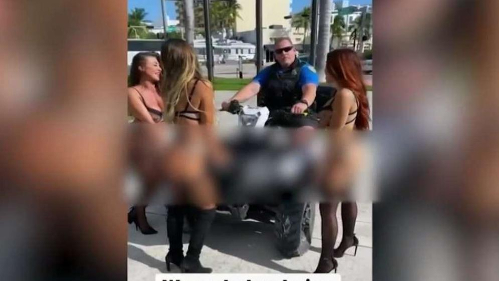 wptv-miami-beach-officer-lingerie-modelarrest.jpg