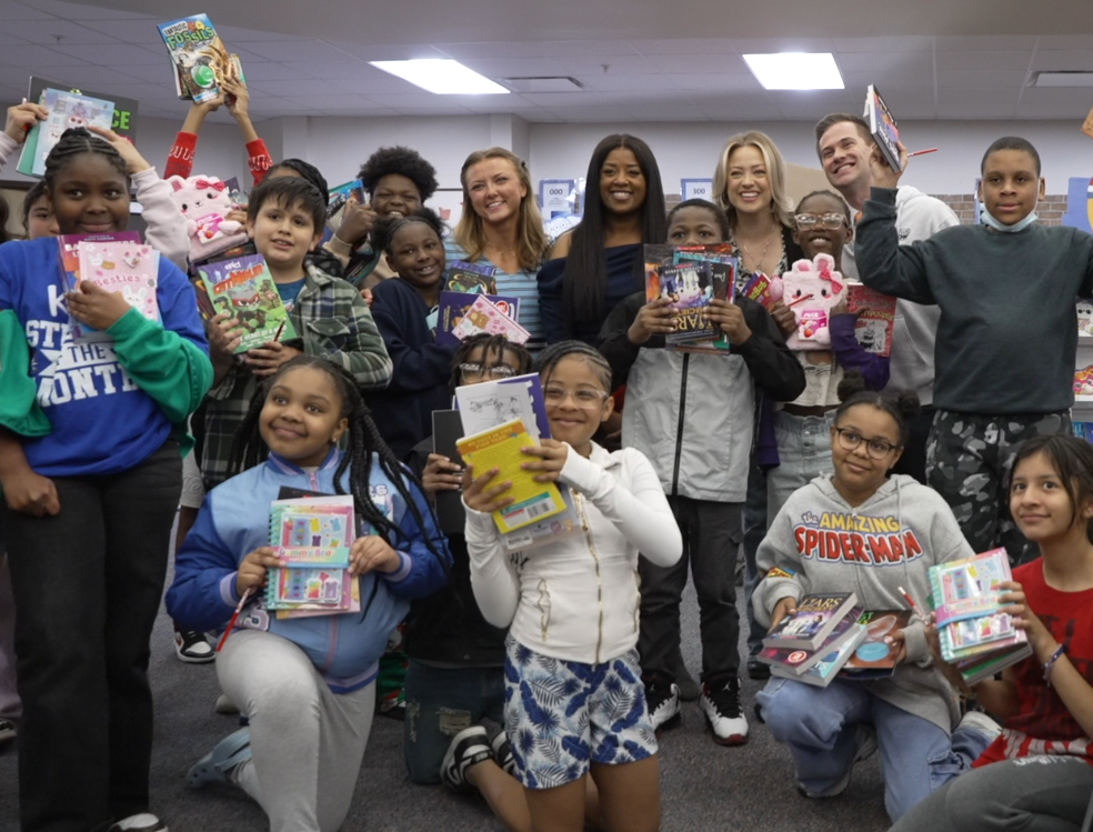 3 News Now staff join a group of King Cubs on May 4, 2026 to celebrate reading.
