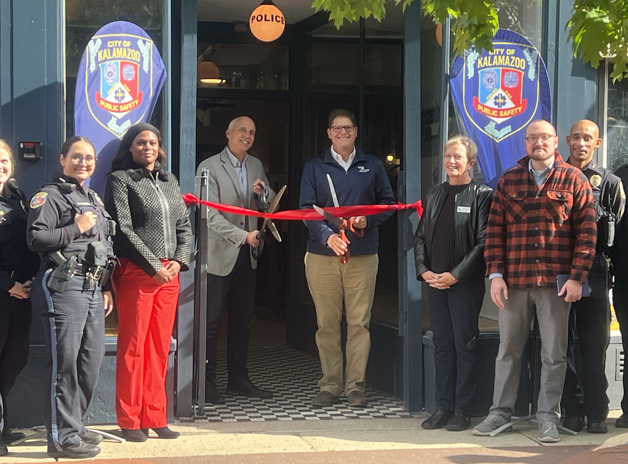 Mayor Anderson, community leaders, and KDPS gather for ribbon-cutting ceremony for the downtown substation. 