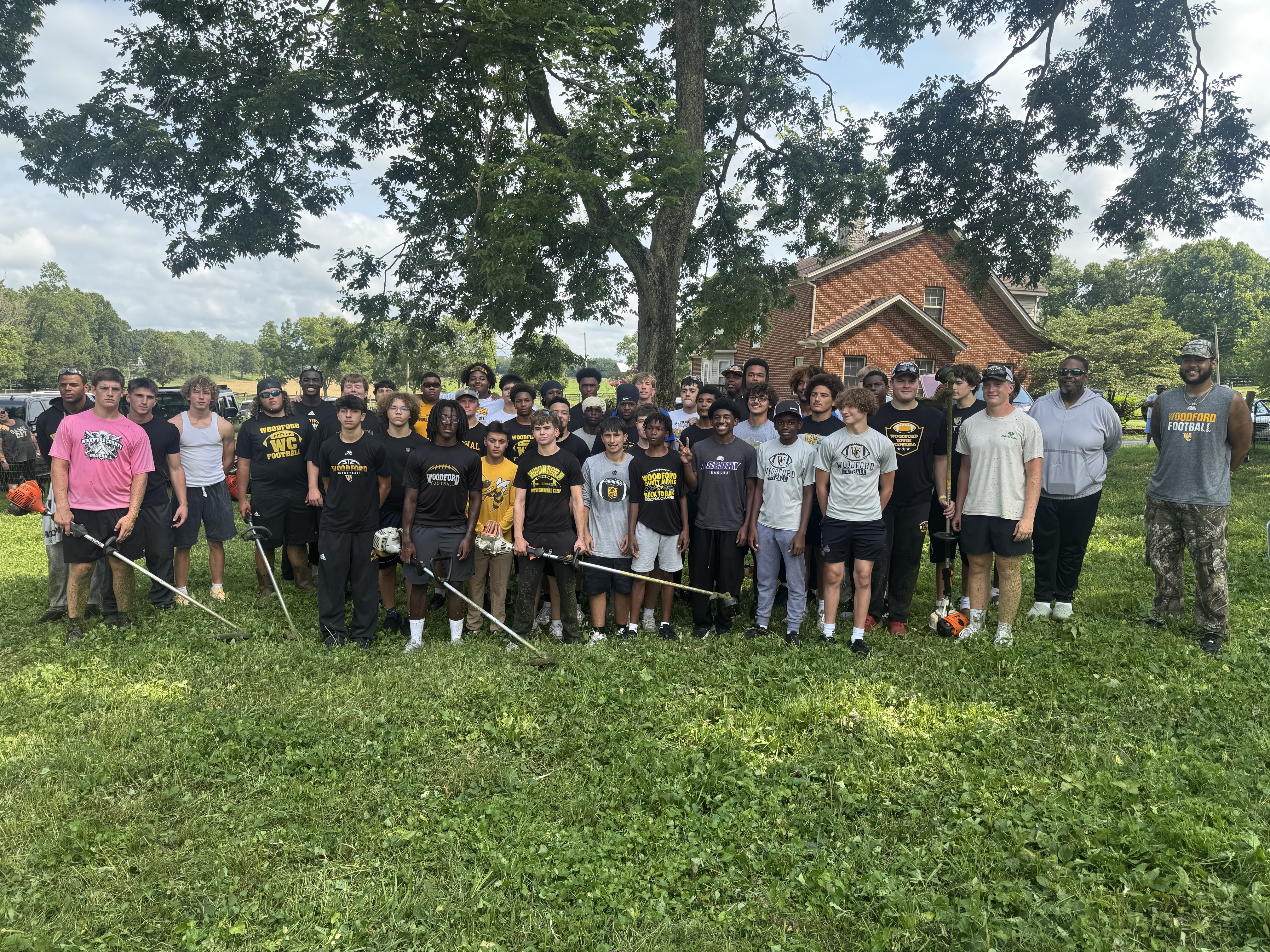 Woodford football players restore historic Huntertown cemetery