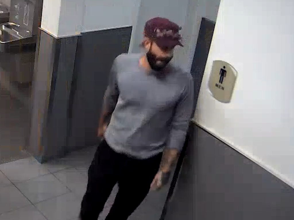 Man leaving restroom