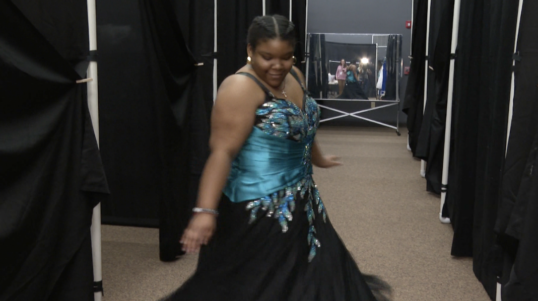 Michelle Garrison shows off the dress she picked out for prom