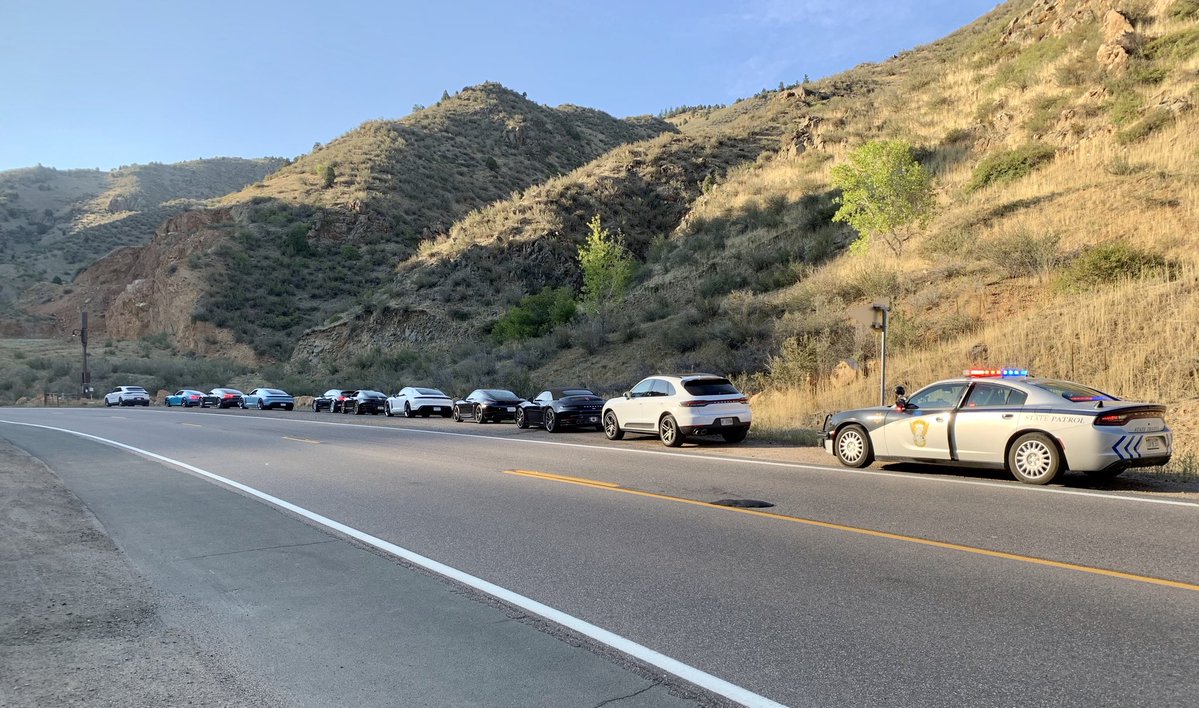 pack of porsches pulled over for speeding.jpg