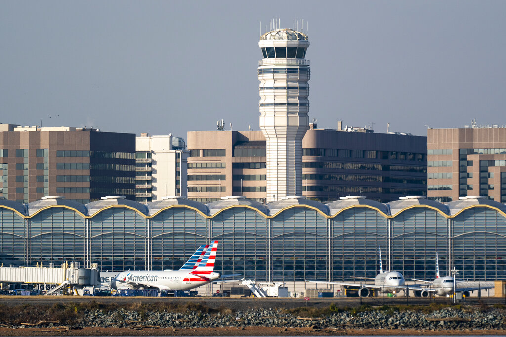 File photo of passenger planes resting at Reagan National Airport in Washington, Thursday, Nov. 11, 2021.