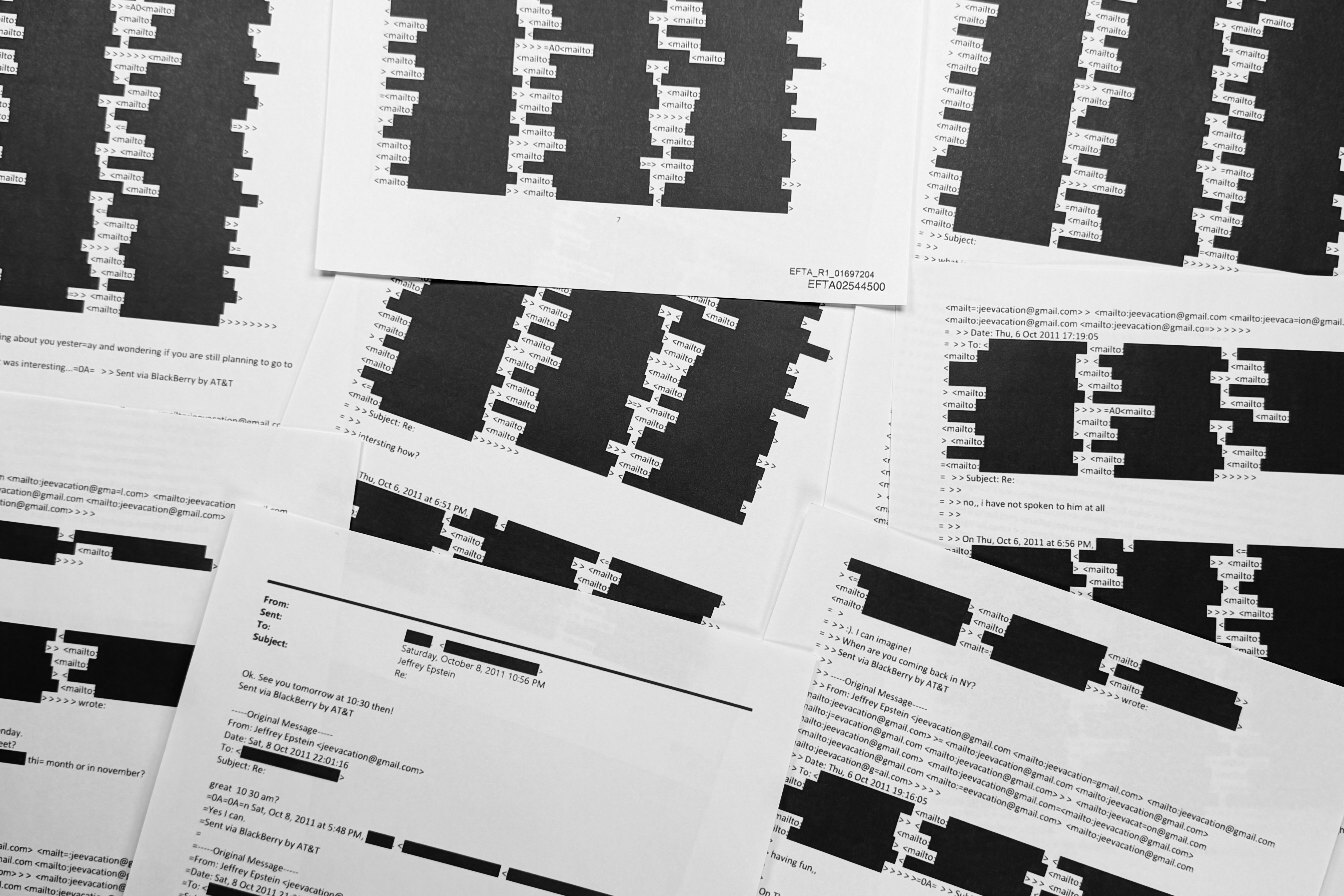 A document with an email chain from Jeffrey Epstein illustrates the amount of redactions of personally identifiable information that the U.S. Department of Justice was required to do before release of Epstein documents, is photographed Sunday, Feb. 1, 2026. 