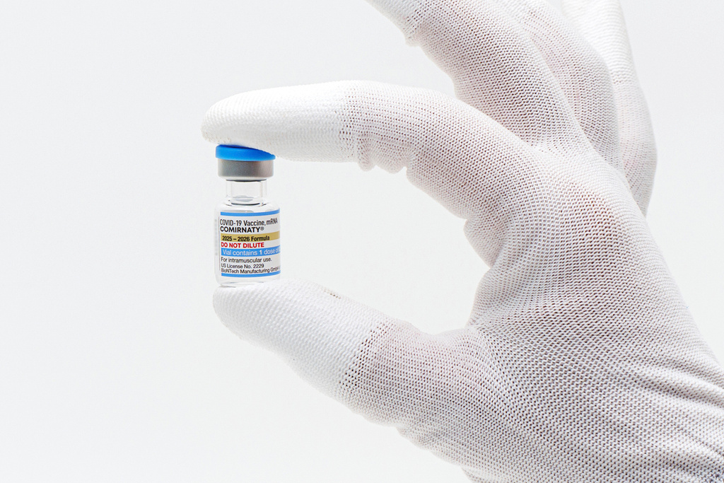 This photo provided by Pfizer in August 2025 shows a vial of the updated COVID-19 vaccine Comirnaty.