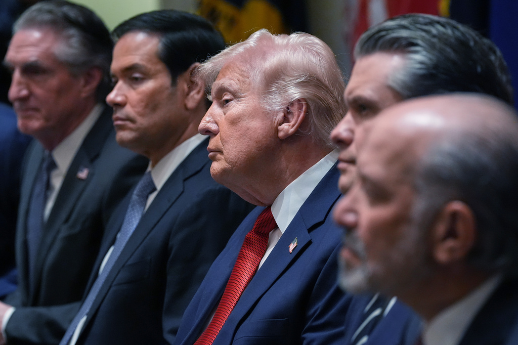 From left, Interior Secretary Doug Burgum, Secretary of State Marco Rubio, President Donald Trump, Defense Secretary Pete Hegseth, and Commerce Secretary Howard Lutnick listen during a Cabinet meeting at the White House, Thursday, March 26, 2026, in Washington. 