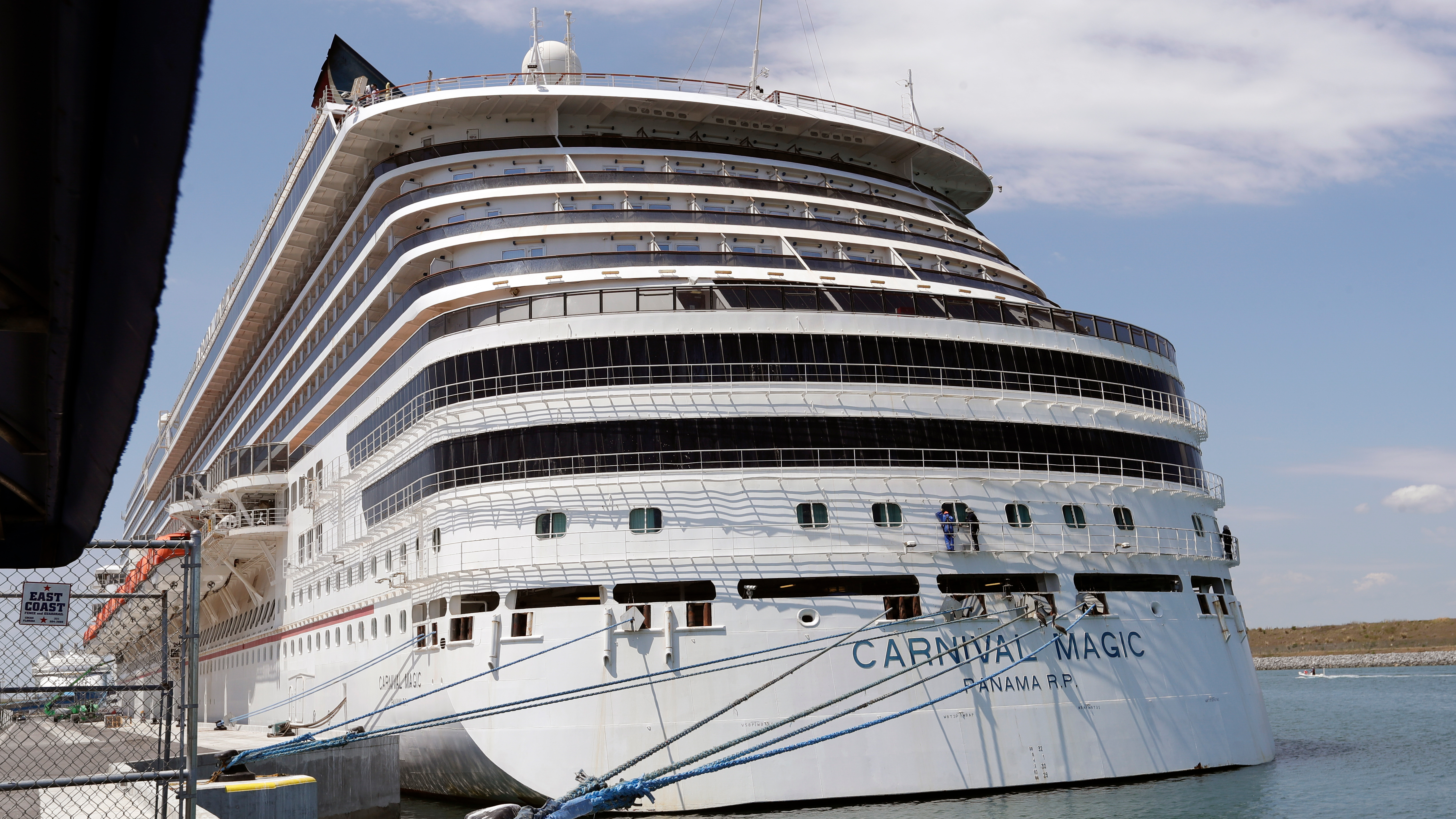FILE - The Carnival cruise line ship Carnival Magic sits docked on April, 2020, in Cape Canaveral, Fla. The U.S. Coast Guard said Tuesday, May 30, 2023, that it's searching for a man who fell from a cruise ship off the coast of Florida. The 35-year-old was on the Carnival Magic when he fell from the ship about 186 miles east of Jacksonville, Fla., on Monday, May 29. (AP Photo/John Raoux, File)