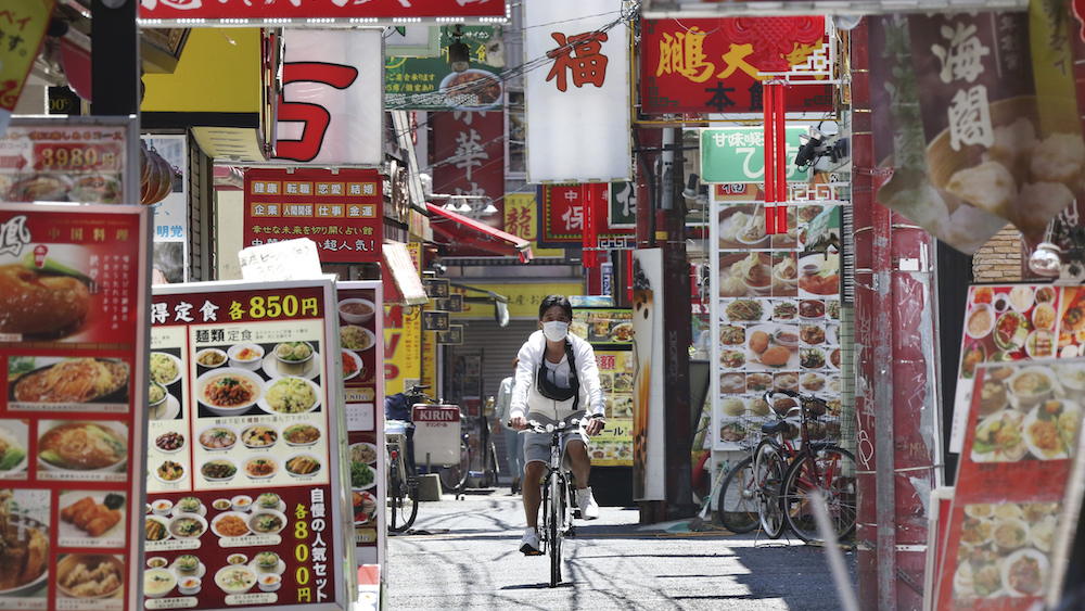 Japan lifts coronavirus state of emergency in most regions of country, but not in Tokyo