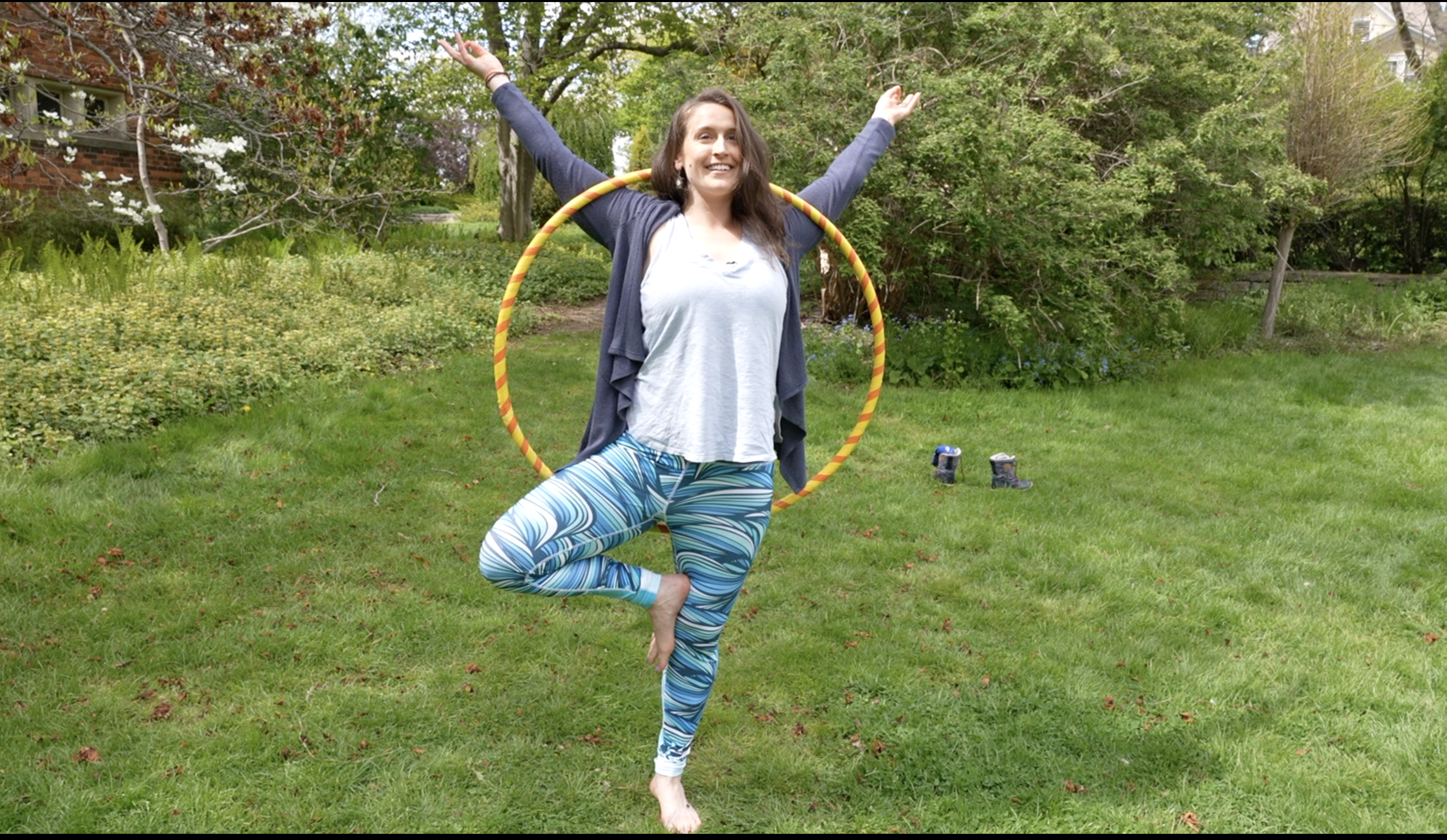 Jenny Wagemann practicing yoga with a hula hoop